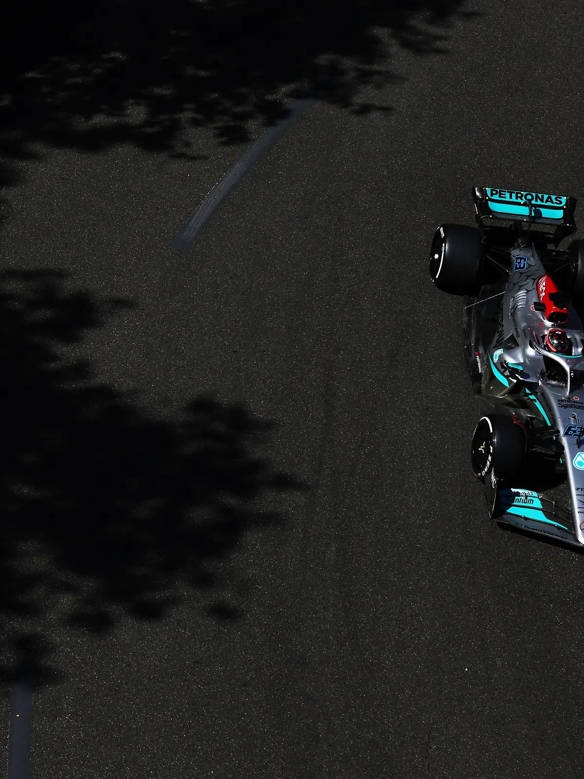 BAKU, AZERBAIJAN - JUNE 12: George Russell of Great Britain driving the (63) Mercedes AMG Petronas F1 Team W13 on track during the F1 Grand Prix of Azerbaijan at Baku City Circuit on June 12, 2022 in Baku, Azerbaijan. (Photo by Clive Rose/Getty Images)