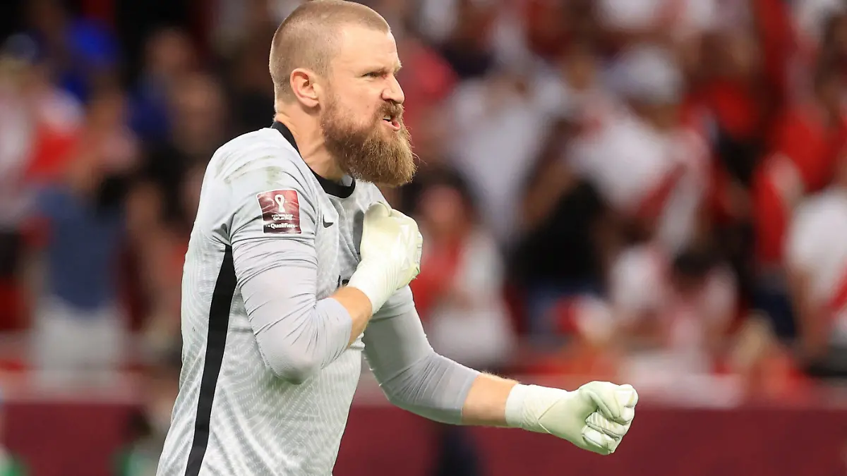 Soccer Football - FIFA World Cup Qualifier - Australia v Peru - Al Rayyan Stadium, Al Rayyan, Qatar - June 13, 2022 Australia's Andrew Redmayne celebrates after saving a penalty during the shootout REUTERS/Mohammed Dabbous