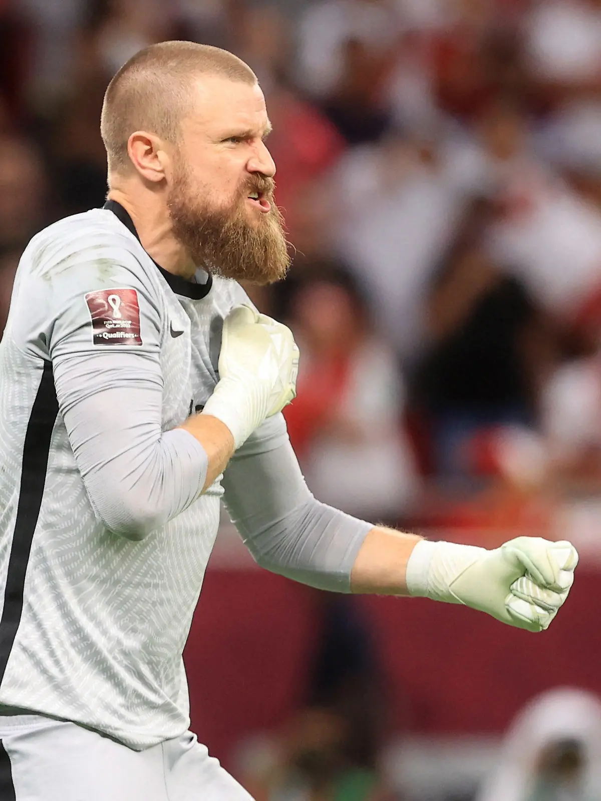 Soccer Football - FIFA World Cup Qualifier - Australia v Peru - Al Rayyan Stadium, Al Rayyan, Qatar - June 13, 2022 Australia's Andrew Redmayne celebrates after saving a penalty during the shootout REUTERS/Mohammed Dabbous