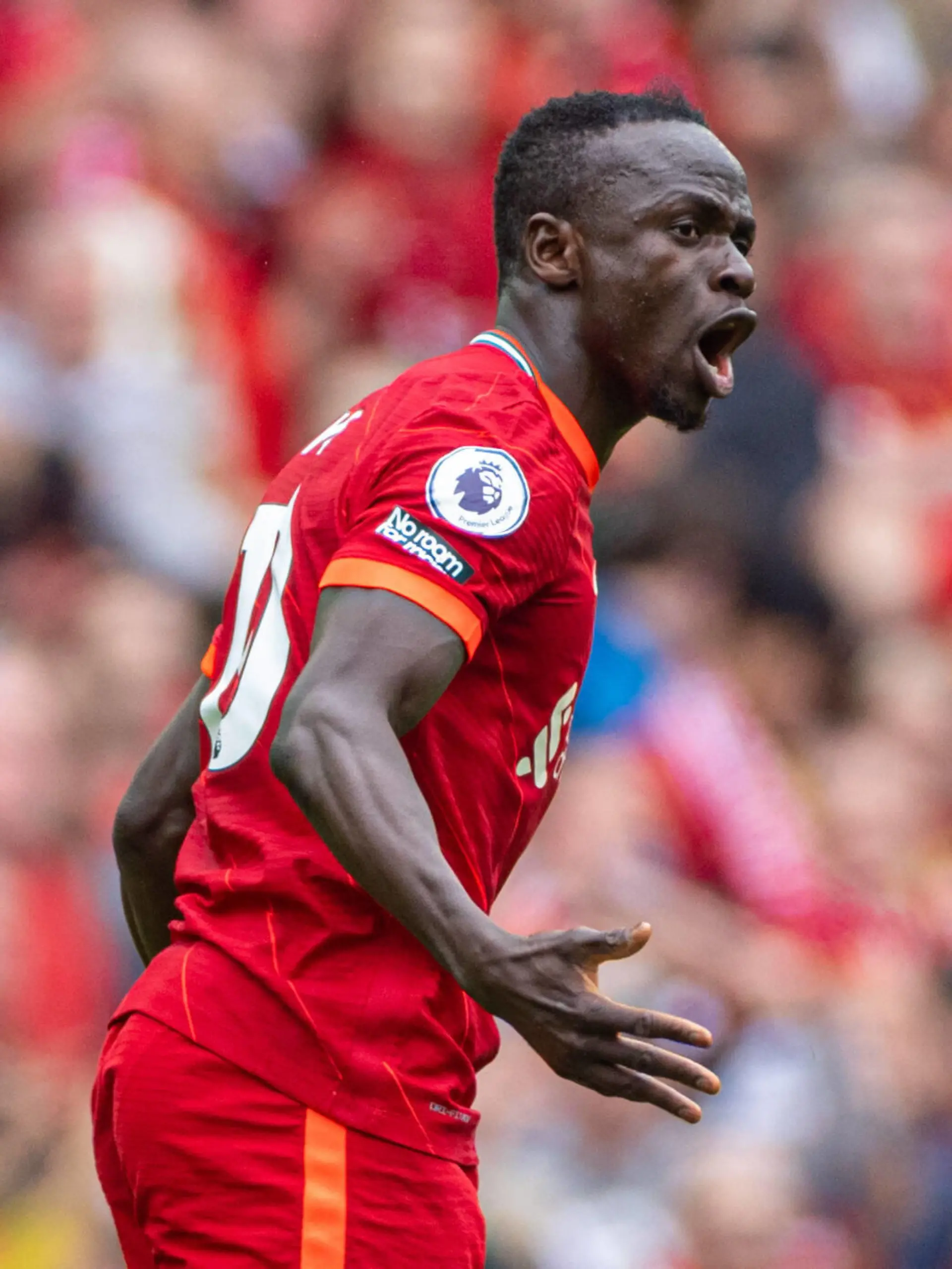  220523 -- LIVERPOOL, May 23, 2022  -- Liverpool s Sadio Mane celebrates after scoring the first equalising goal during the English Premier League match between Liverpool and Wolverhampton Wanderers in Liverpool, Britain, on May 22, 2022.  FOR EDITORIAL USE ONLY. NOT FOR SALE FOR MARKETING OR ADVERTISING CAMPAIGNS. NO USE WITH UNAUTHORIZED AUDIO, VIDEO, DATA, FIXTURE LISTS, CLUB/LEAGUE LOGOS OR LIVE SERVICES. ONLINE IN-MATCH USE LIMITED TO 45 IMAGES, NO VIDEO EMULATION. NO USE IN BETTING, GAMES OR SINGLE CLUB/LEAGUE/PLAYER PUBLICATIONS. SPBRITAIN-LIVERPOOL-FOOTBALL-PREMIER LEAGUE-LIVERPOOL VS WOLVERHAMPTON WANDERERS Xinhua PUBLICATIONxNOTxINxCHN