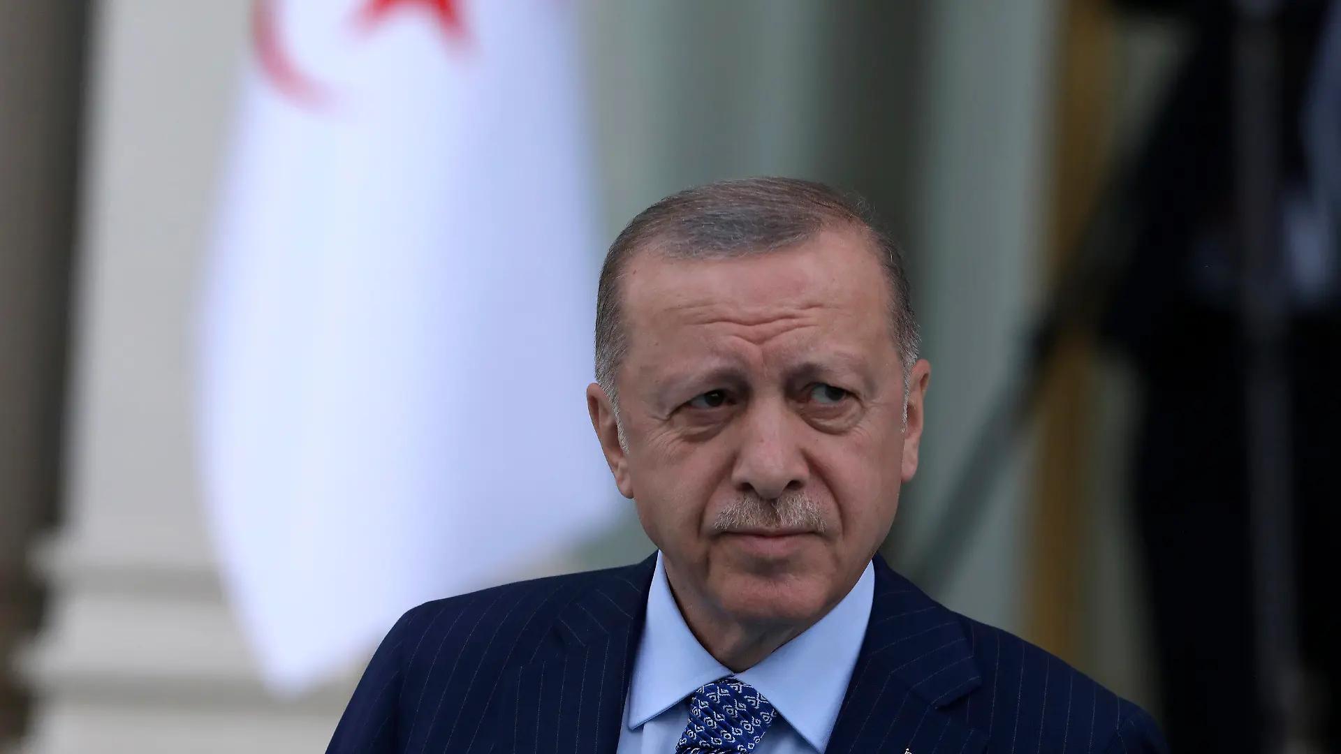 FILE - Turkish President Recep Tayyip Erdogan arrives for a ceremony, in Ankara, Turkey, May 16, 2022. Analysts say Erdogan is taking advantage of the war in Ukraine to push his own agenda in Syria — even using Turkey’s veto powers as a NATO member to block alliance membership by Finland and Sweden as potential leverage. But an incursion by Ankara would be risky, threatening to upset its ties with both the United States and Russia.  (AP Photo/Burhan Ozbilici, File)
