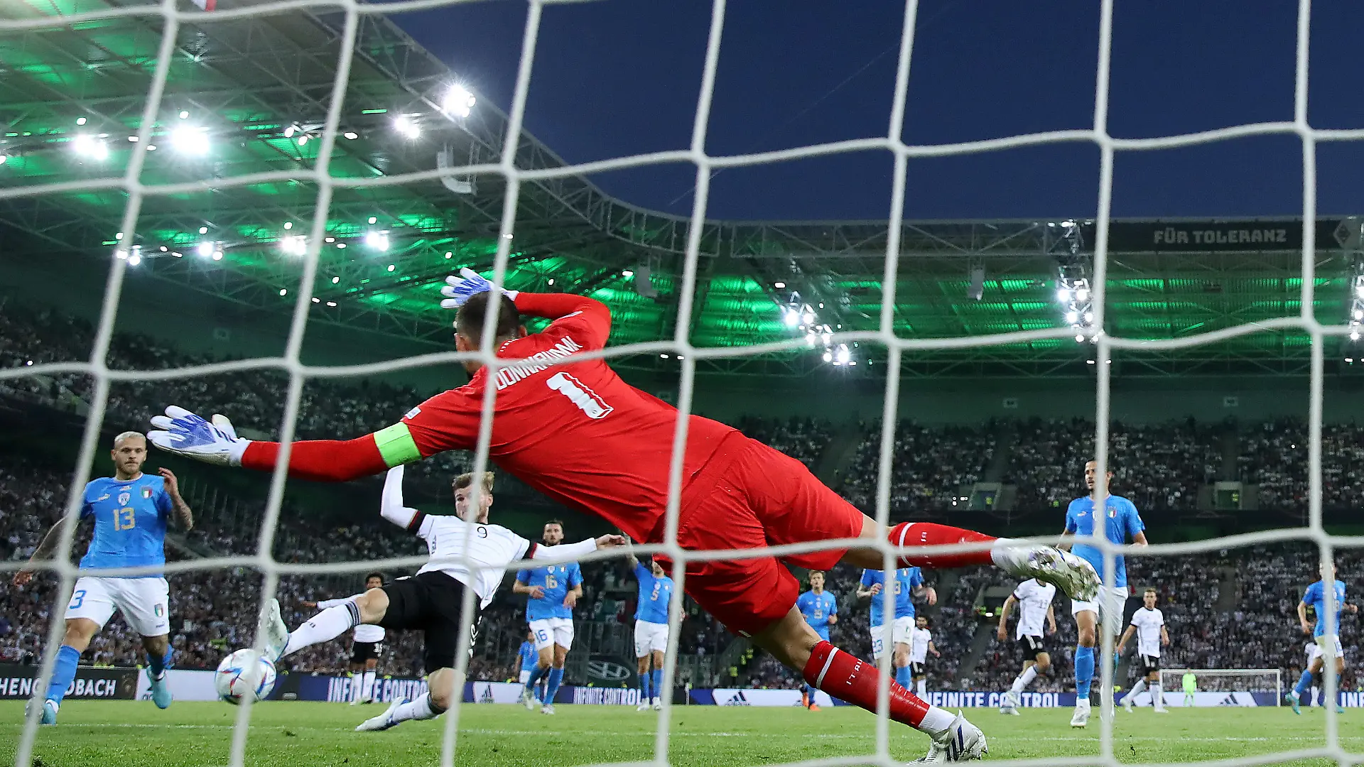 MOENCHENGLADBACH, GERMANY - JUNE 14: Timo Werner of Germany scores their team's fourth goal past Gianluigi Donnarumma of Italy during the UEFA Nations League - League A Group 3 match between Germany and Italy at Borussia Park Stadium on June 14, 2022 in Moenchengladbach, Germany. (Photo by Alex Grimm/Getty Images)