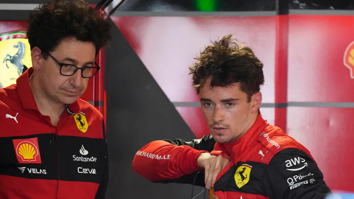 Ferrari driver Charles Leclerc of Monaco speaks with Ferrari team principal Mattia Binotto following the first practice session for the Formula One Miami Grand Prix auto race at the Miami International Autodrome, Friday, May 6, 2022, in Miami Gardens, Fla. (AP Photo/Darron Cummings)