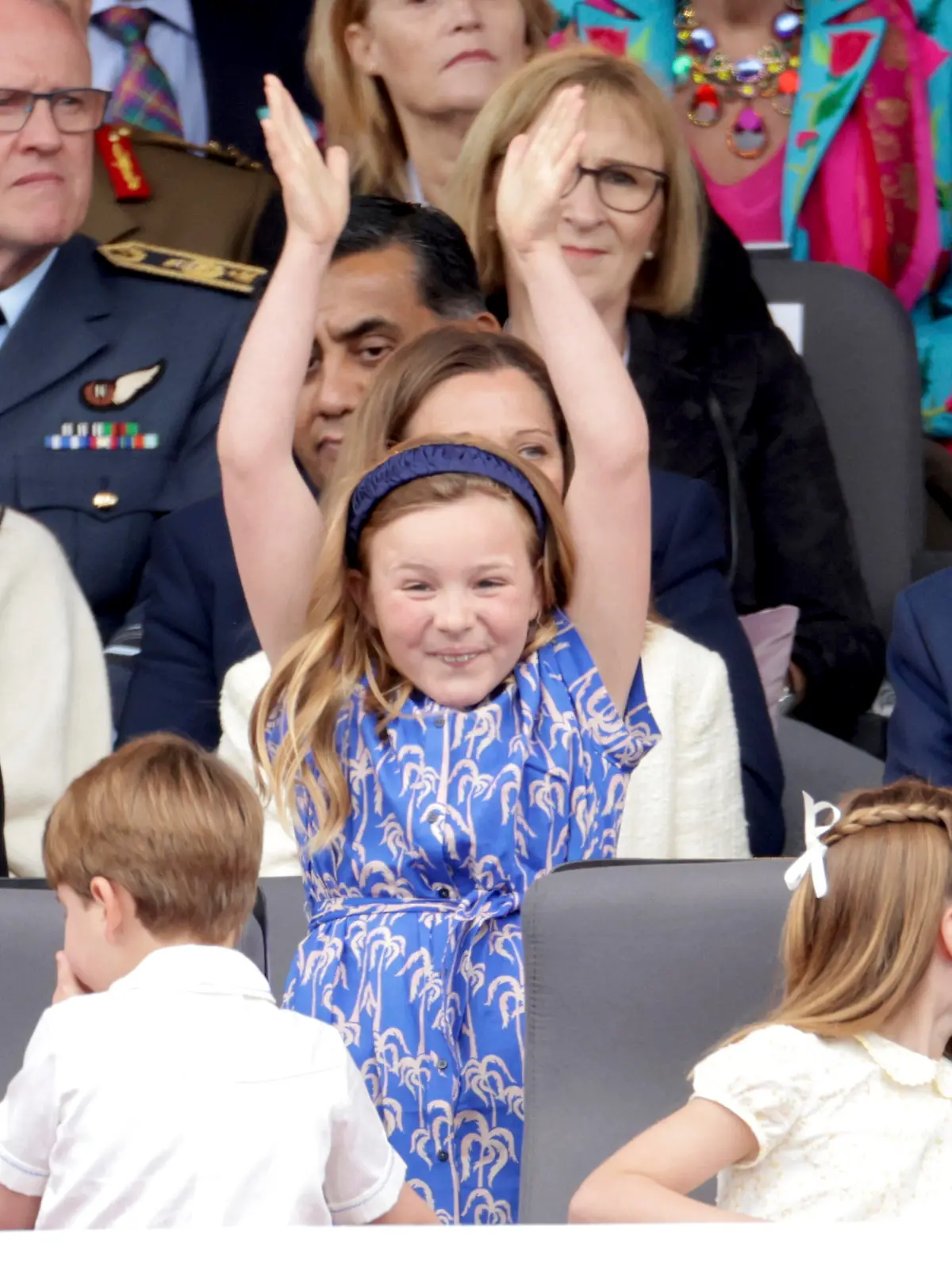 Mia Tindall gestures, during the Platinum Jubilee Pageant outside Buckingham Palace in London, Sunday June 5, 2022, on the last of four days of celebrations to mark the Platinum Jubilee. The pageant will be a carnival procession up The Mall featuring giant puppets and celebrities that will depict key moments from Queen Elizabeth II’s seven decades on the throne. (Chris Jackson/Pool Photo via AP)