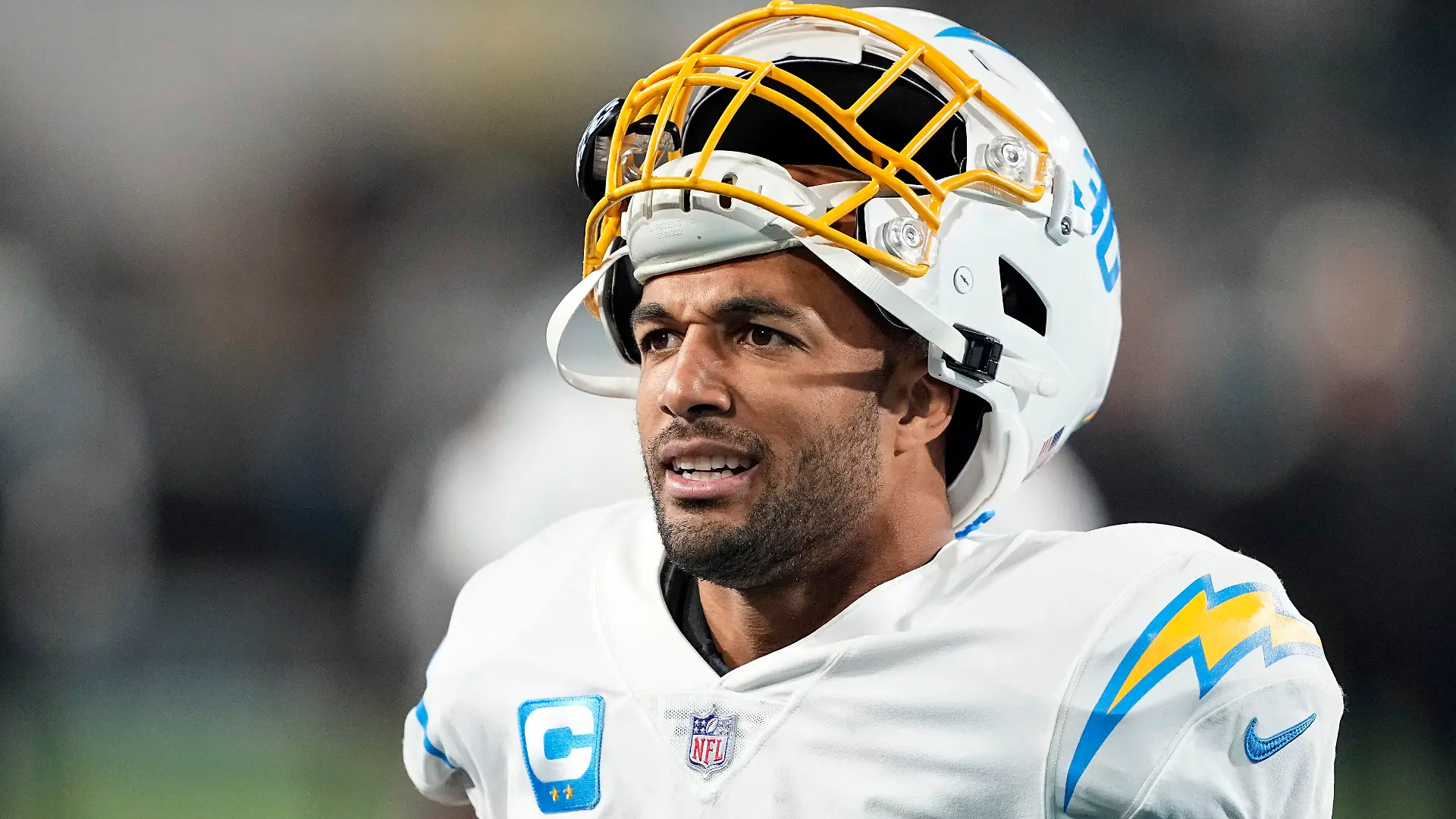FILE- Los Angeles Chargers running back Austin Ekeler (30) warms up before an NFL wild-card football game against the Jacksonville Jaguars, Saturday, Jan. 14, 2023, in Jacksonville, Fla. The Los Angeles Chargers have avoided a holdout by running back Austin Ekeler, by adding $1.75 million in incentives to his contract for the upcoming season according to a person with knowledge of the deal. (AP Photo/Chris Carlson, File)