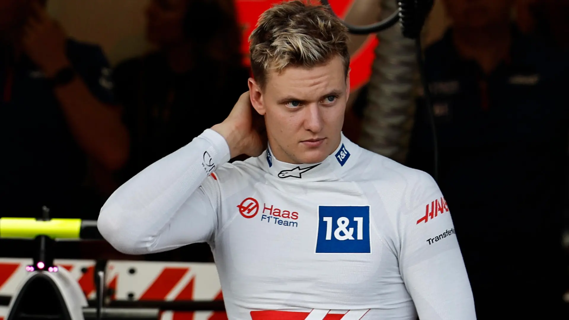 Haas driver Mick Schumacher of Germany stands outside Haas garage during the qualifying session at the Baku circuit, in Baku, Azerbaijan, Saturday, June 11, 2022. The Formula One Grand Prix will be held on Sunday. (Hamad Mohammed), Pool Via AP)