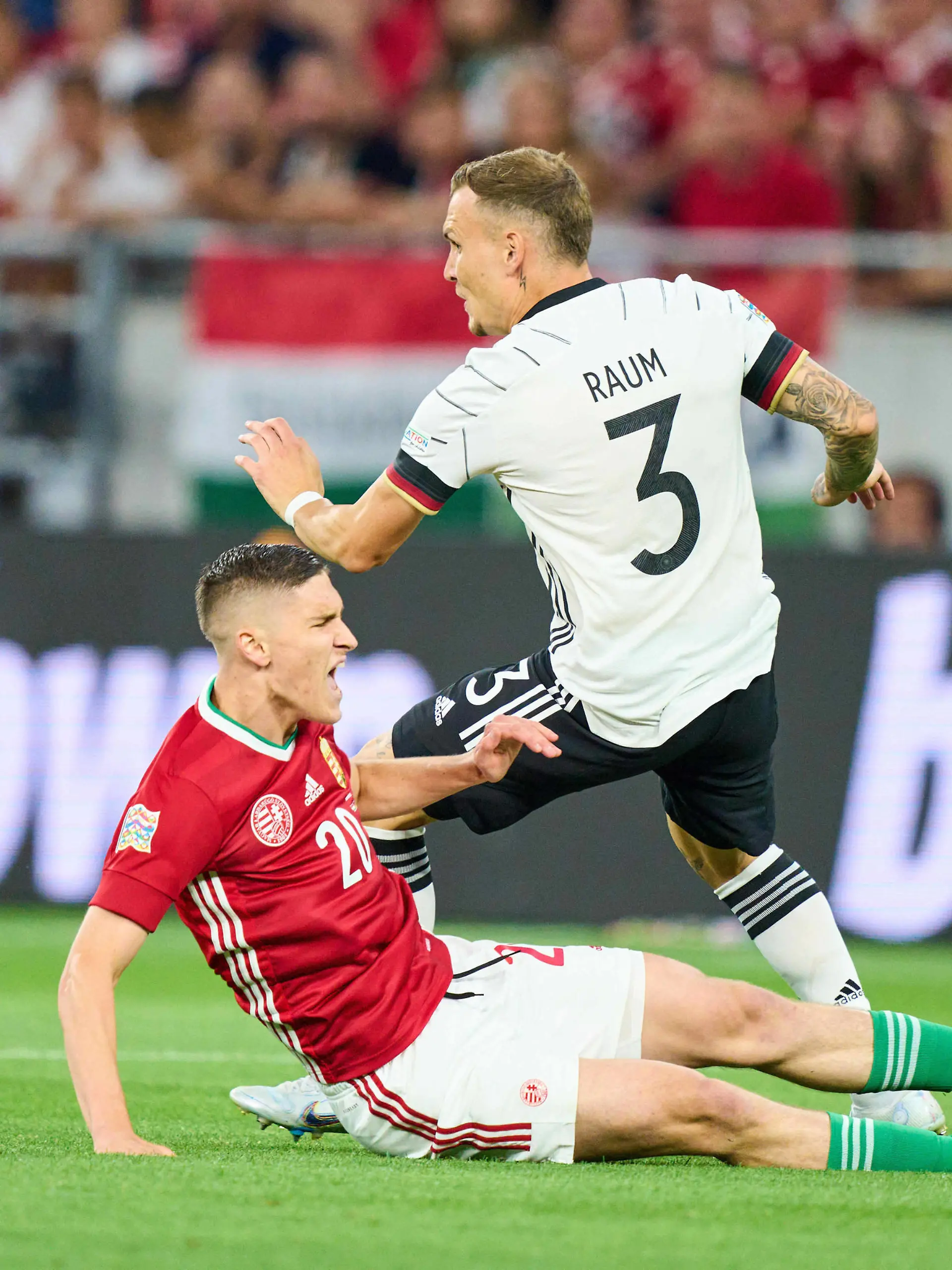  David Raum, DFB 3 compete for the ball, tackling, duel, header, zweikampf, action, fight against Roland Sallai, HUN 20 in the UEFA Nations League 2022 match HUNGARY - GERMANY in Season 2022/2023 on Juni 11, 2022 in Budapest, Hungary.