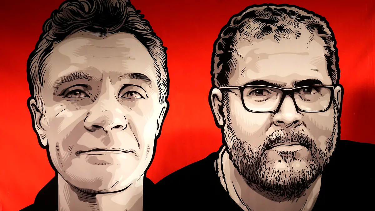 Images of British journalist Dom Phillips, left, and Indigenous affairs expert Bruno Araujo Pereira are seen on a sign presented by employees of the National Indigenous Foundation, FUNAI, during a vigil in Brasilia, Brazil, Thursday, June 9, 2022. Federal Police and military forces are carrying out a search and investigation into the disappearance of Phillips and Araujo Pereira. (AP Photo/Eraldo Peres)