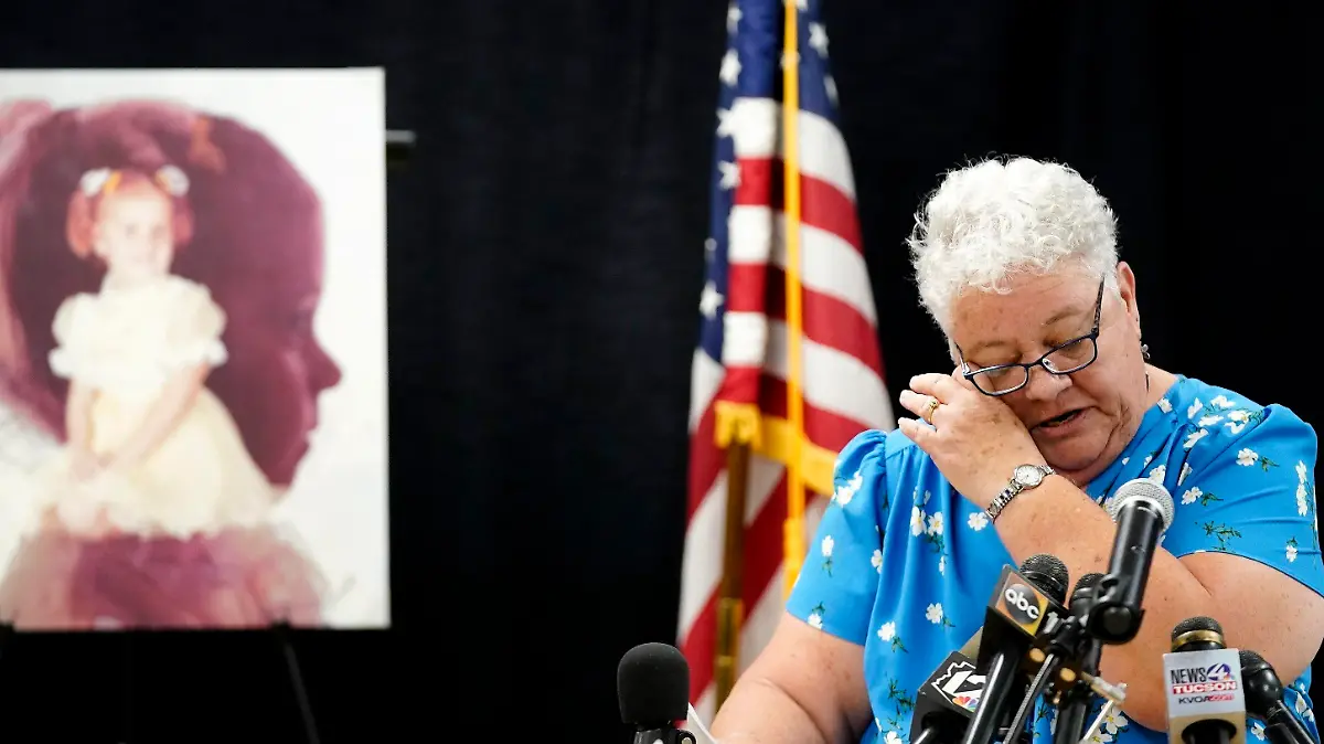 Debbie Carlson, mother of murdered 8-year-old Vicki Lynne Hoskinson, wipes away a tear as she speaks at a news conference after Frank Atwood was put to death by lethal injection at the Arizona state prison Wednesday, June 8, 2022, in Florence, Ariz. Atwood was convicted in the 1984 killing of Hoskinson was executed in what would be the state's second execution since officials started carrying out the death penalty in May after a nearly eight-year hiatus. (AP Photo/Ross D. Franklin)