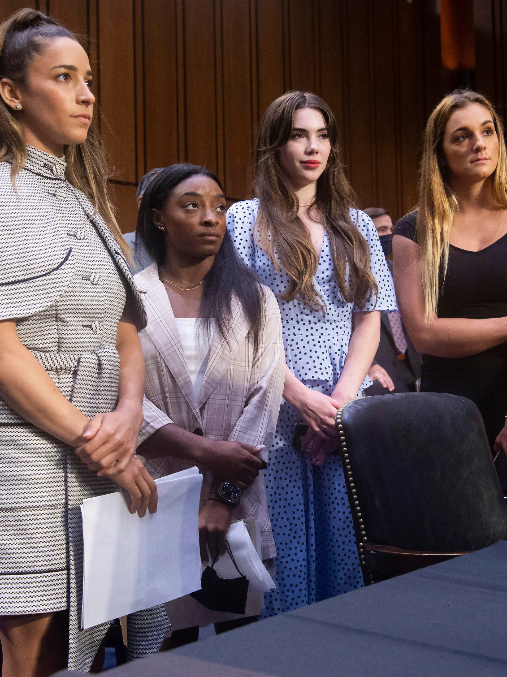 United States gymnasts from left, Aly Raisman, Simone Biles, McKayla Maroney and Maggie Nichols, leave after testifying at a Senate Judiciary hearing about the Inspector General's report on the FBI's handling of the Larry Nassar investigation on Capitol Hill, Wednesday, Sept. 15, 2021, in Washington. Nassar was charged in 2016 with federal child pornography offenses and sexual abuse charges in Michigan. He is now serving decades in prison after hundreds of girls and women said he sexually abused them under the guise of medical treatment when he worked for Michigan State and Indiana-based USA Gymnastics, which trains Olympians. (Saul Loeb/Pool via AP)