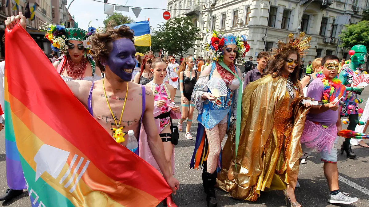 Participants attend a gay pride march in Kiev, Ukraine, 23 June, 2019. Several thousand people have taken part in Kiev's gay pride event amid a heavy police presence as nationalist protesters tried to halt the event. (Photo by STR/NurPhoto)