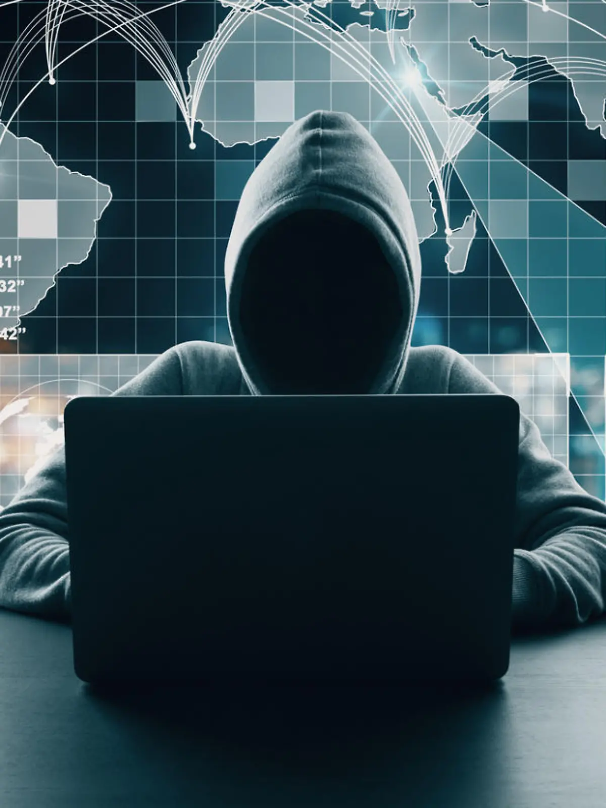 Hacker at desktop using laptop with abstract digital map interface on blurry background. Global network and travel concept. Multiexposure