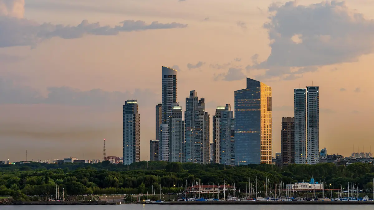 Large modern apartment buildings of Puerto Madero by the shoreline in Buenos Aires Argentina at sunset