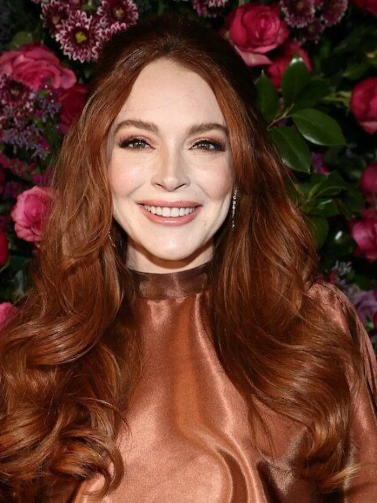 Lindsay Lohan attends the Christian Siriano Fall/Winter 2023 fashion show on Feb. 9, 2023, in New York City. (Jamie McCarthy/New York Daily News/TNS) picture alliance