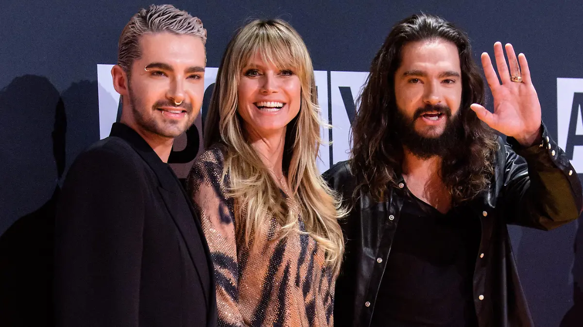 18.04.2019, Bayern, Grünwald: Bill Kaulitz, Sänger der Band Tokio Hotel (l-r), Heidi Klum, Model, und ihr Verlobter, Tom Kaulitz, Sänger der Band Tokio Hotel, kommen zur Verleihung der "About you"-Awards an die Social-Media-Persönlichkeiten des Jahres in der Bavaria-Filmstadt. Foto: Matthias Balk/dpa +++ dpa-Bildfunk +++