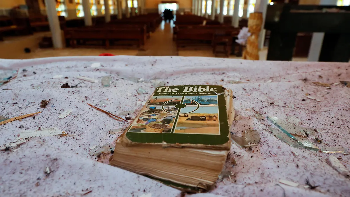 A bible is seen on a pulpit in St. Francis Catholic Church where worshippers were attacked by gunmen during Sunday mass service, is pictured in Owo, Ondo, Nigeria, June 6, 2022. REUTERS/Temilade Adelaja