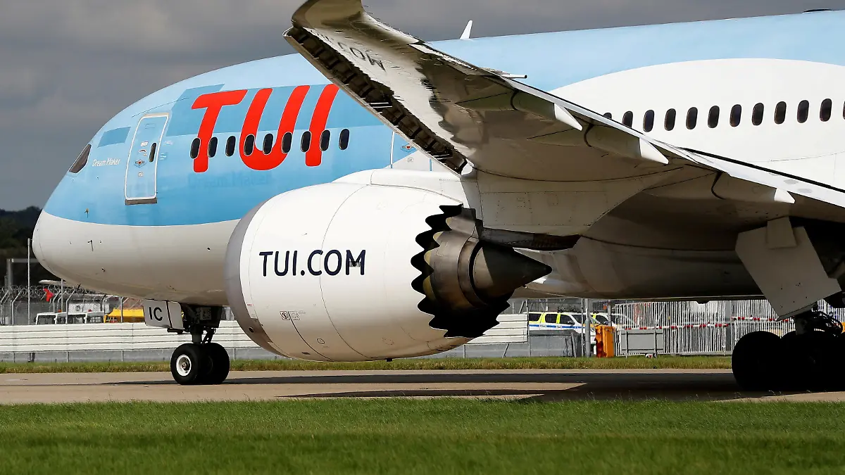FILE PHOTO: A Boeing 787 of the travel company TUI taxis close to the northern runway at Gatwick Airport in Crawley, Britain, August 25, 2021. REUTERS/Peter Nicholls/File Photo