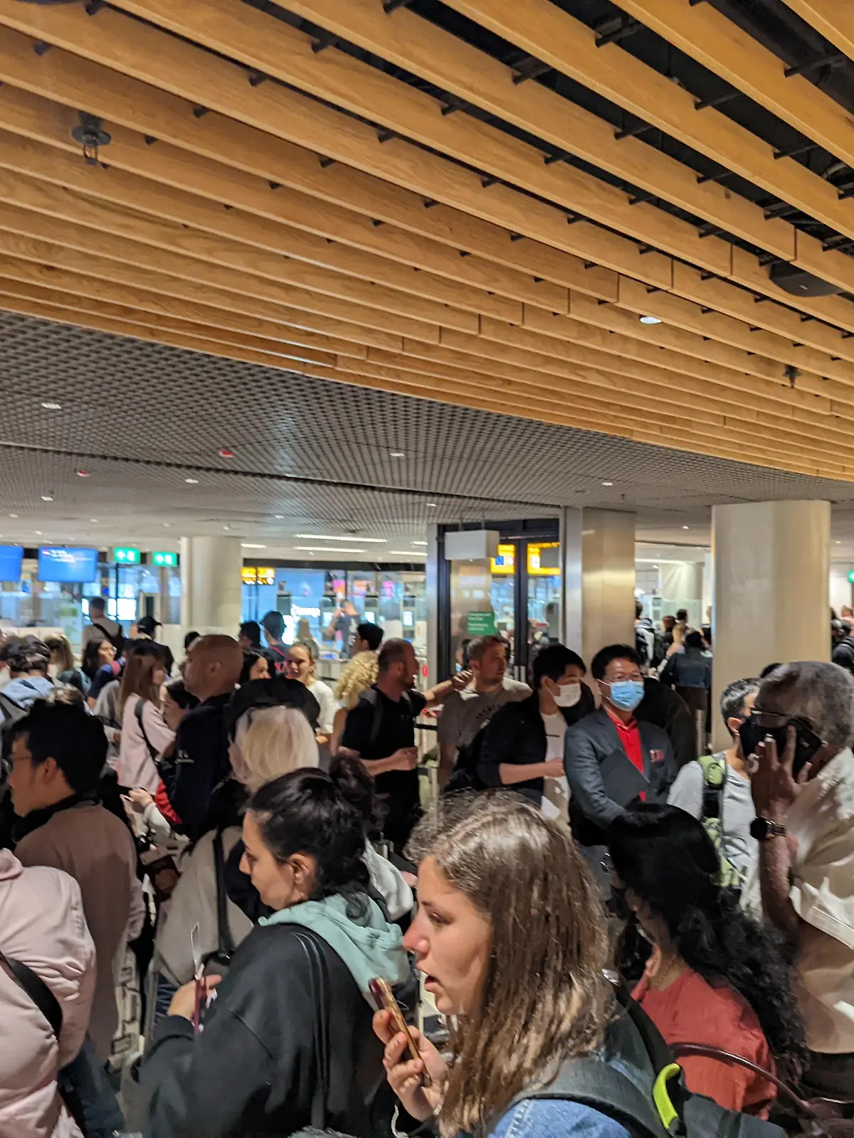 Travelers wait in lines at Amsterdam Schiphol Airport after KLM, the Dutch arm of Air France-KLM, said it would not bring any further passengers on Saturday from European destinations to Amsterdam's Schiphol Airport, its main hub, in Amsterdam, Netherlands June 4, 2022 in this picture obtained from social media. Twitter/Prof. Daniel Angus/via REUTERS  THIS IMAGE HAS BEEN SUPPLIED BY A THIRD PARTY. MANDATORY CREDIT. NO RESALES. NO ARCHIVES.