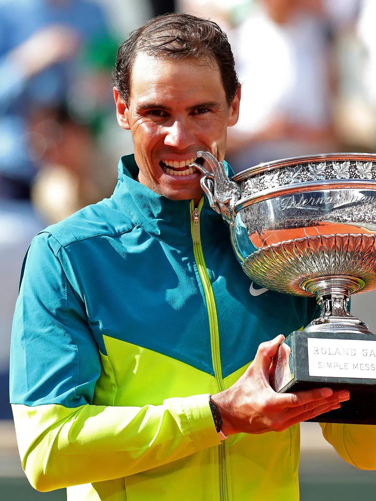 5th June 2022 Roland Garros, Paris, France: French Open Tennis tournament, mens singles final, Rafael Nadal versus Casper Ruud Rafa Nadal ESP bites the winner& x2019s trophy after his win against Casper Ruud NOR PUBLICATIONxNOTxINxUK ActionPlus12397498 JonxBromley 
