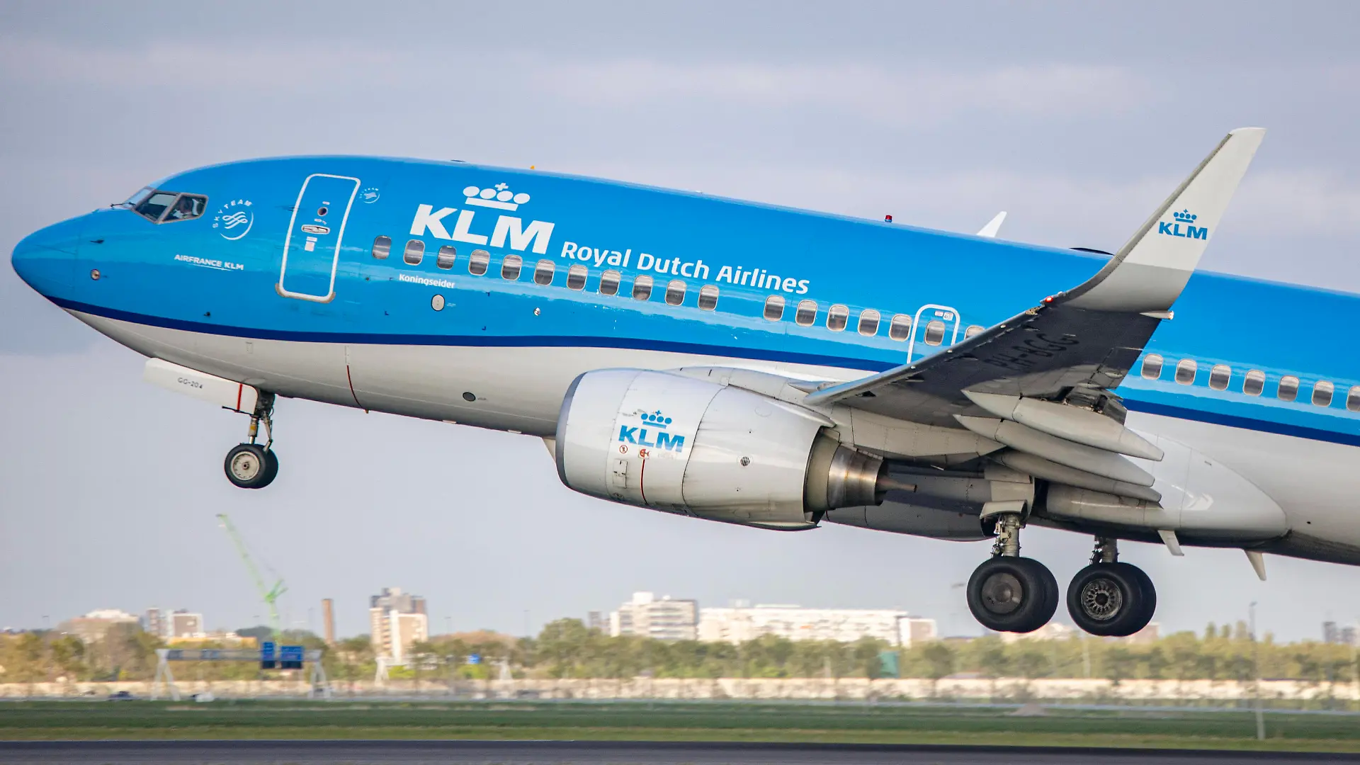 KLM Royal Dutch Airlines Boeing 737 KLM Royal Dutch Airlines Boeing 737 aircraft as seen taxiing, taking off and flying from Polderbaan runway of Amsterdam Schiphol International Airport after passing the control tower. The departing Boeing 737-700 has the registration PH-BGG and the name Koningseider / Kind Eider. KLM Royal Dutch Airlines is the oldest operating airline in the world, legally Koninklijke Luchtvaart Maatschappij N.V. is the Dutch flag carrier airline part of Air France-KLM group and member of SkyTeam airline alliance. KLM cancels flights at Schiphol because of staff shortages in this post-pandemic increased demand for flights as the Covid-19 Coronavirus measures are easing and people travel again more frequently even for tou PUBLICATIONxNOTxINxFRA Copyright: xNicolasxEconomoux originalFilename: economou-klmroyal220427_np7ex.jpg