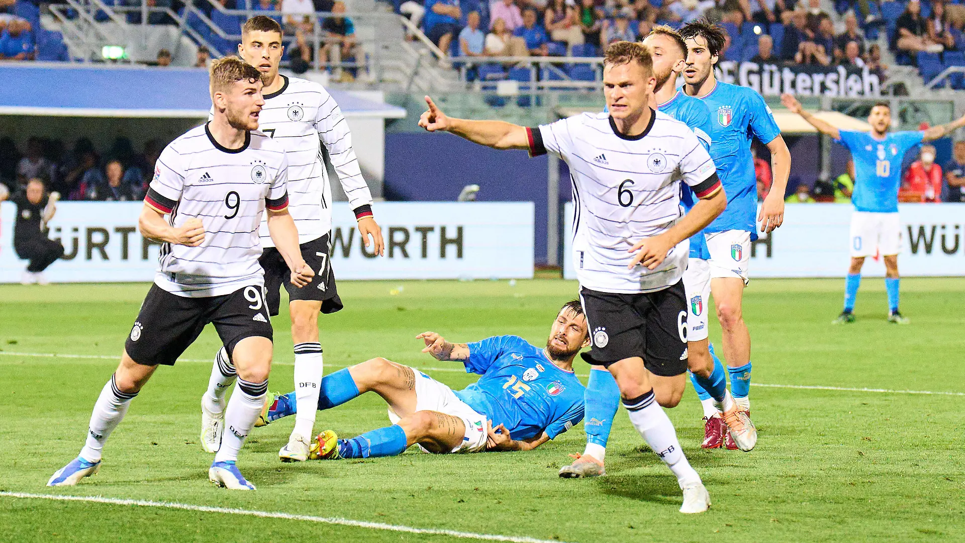 Joshua Kimmich, DFB 6 scores, shoots goal , Tor, Treffer, Torschuss, 1-1, celebrates his goal, happy, laugh, celebration, in the UEFA Nations League 2022 match ITALY - GERMANY in Season 2022/2023 on Juni 04, 2022 in Bologna, Italy.