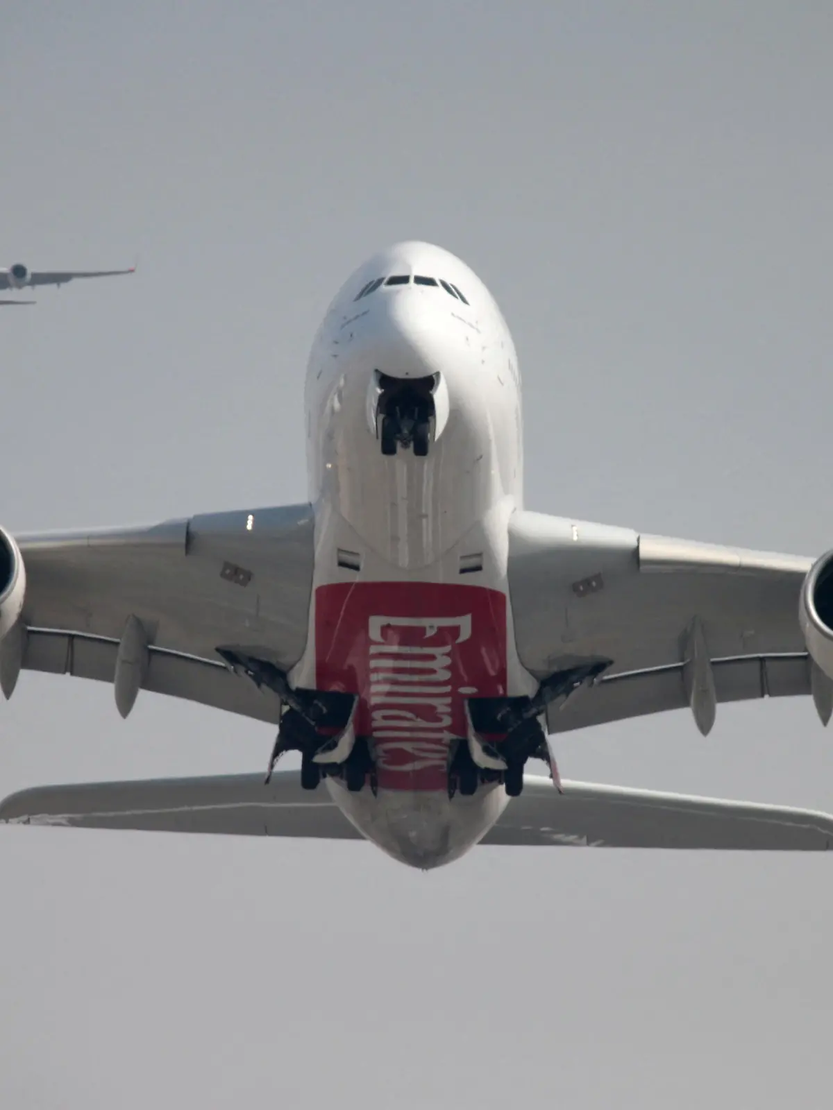 FILE PHOTO: An Emirates Airline Airbus A380-800 plane takes off from Dubai International Airport in Dubai, United Arab Emirates February 15, 2019. REUTERS/Christopher Pike/File Photo