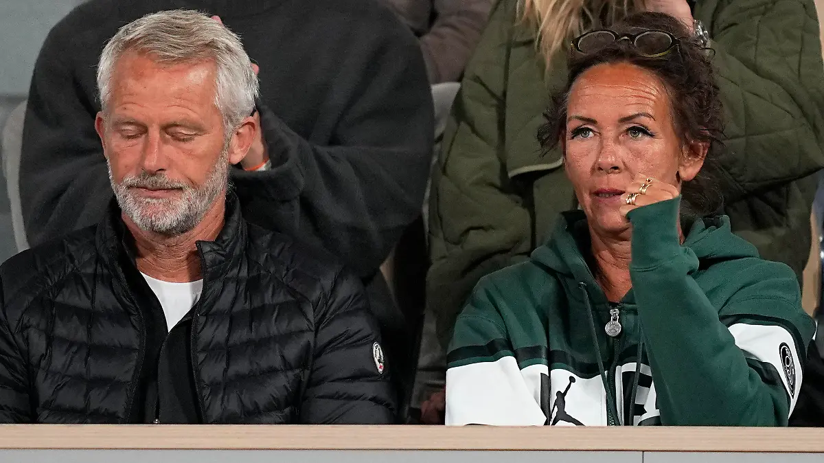 Denmark's Holger Rune's mother Aneke, bottom center, his sister Alma, top center, and coach Lars Christensen. bottom left, watch the quarterfinal match against Norway's Casper Ruud at the French Open tennis tournament in Roland Garros stadium in Paris, France, Wednesday, June 1, 2022. (AP Photo/Michel Euler)