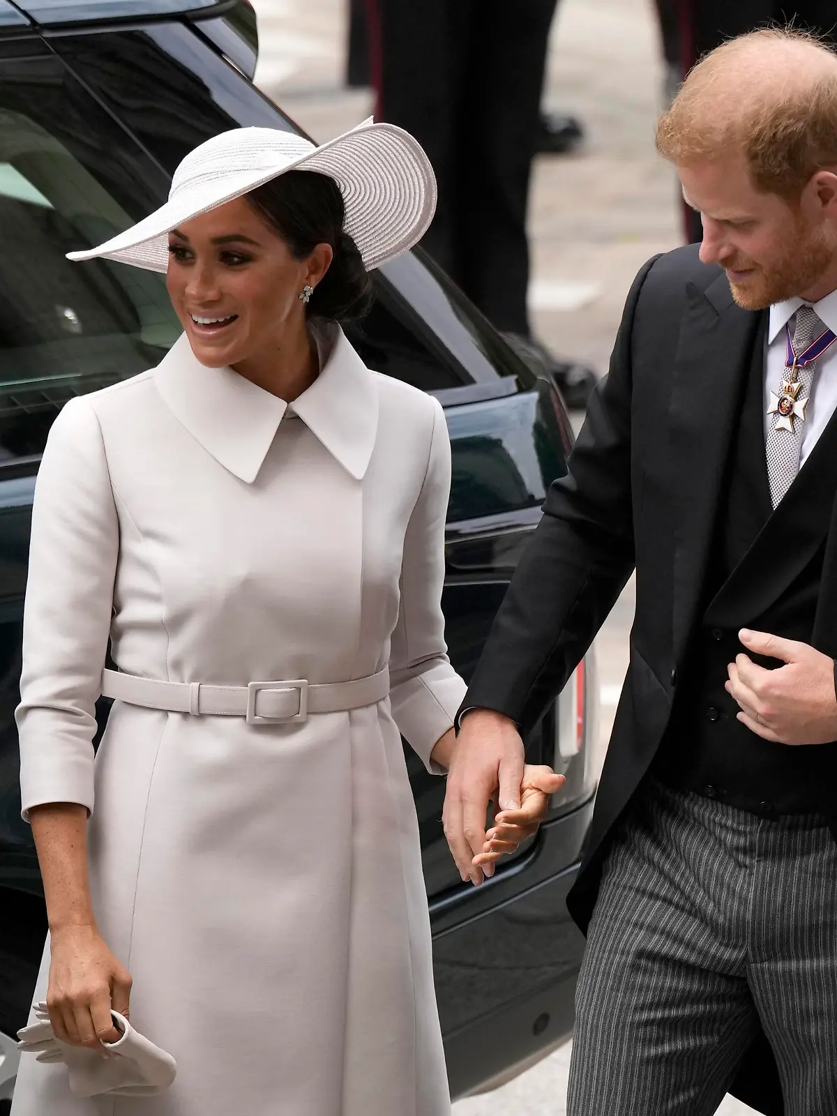 Prince Harry and Meghan Markle, Duke and Duchess of Sussex arrive for a service of thanksgiving for the reign of Queen Elizabeth II at St Paul's Cathedral in London, Friday, June 3, 2022 on the second of four days of celebrations to mark the Platinum Jubilee. The events over a long holiday weekend in the U.K. are meant to celebrate the monarch's 70 years of service. (AP Photo/Matt Dunham, Pool)