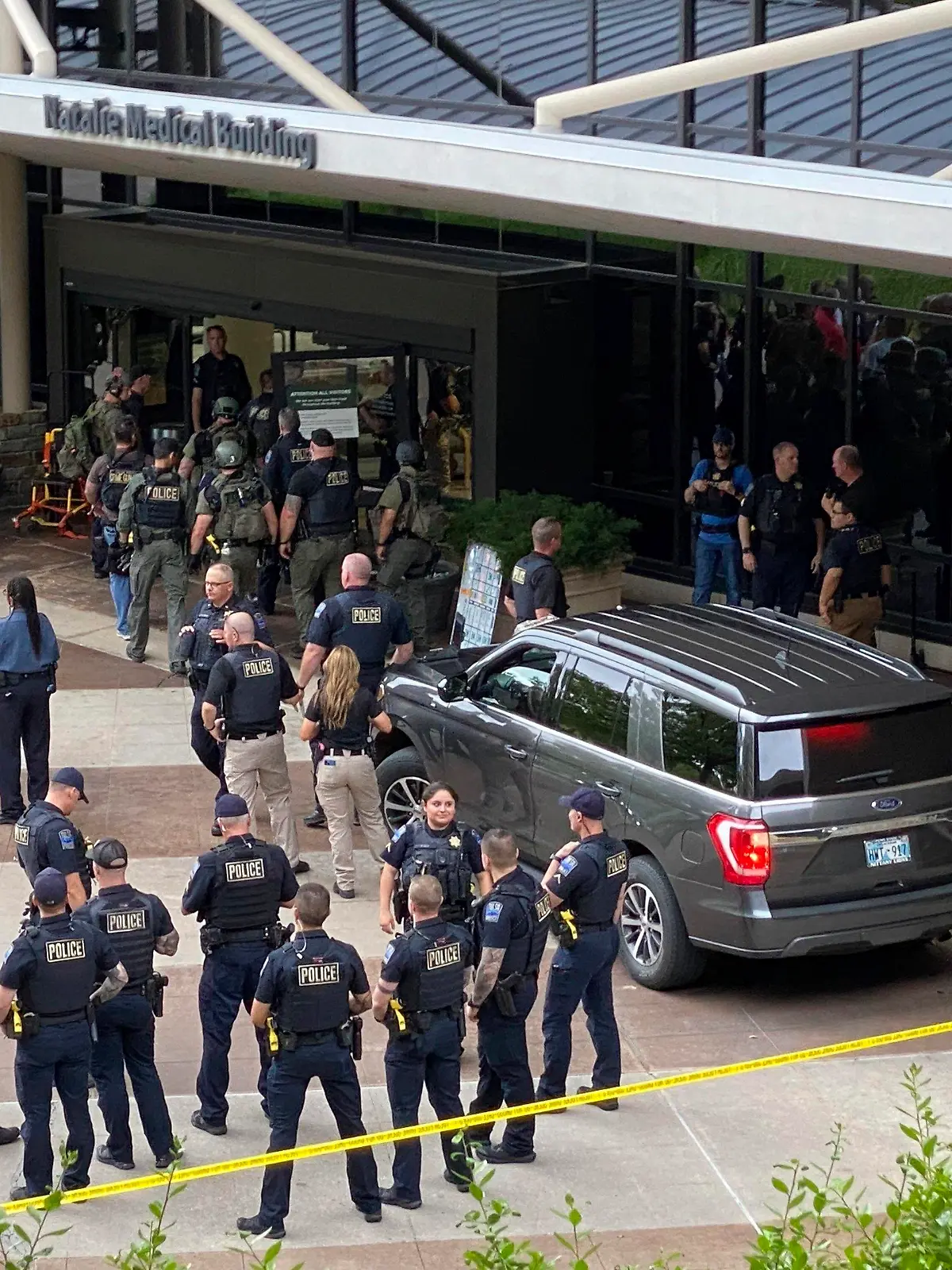 Emergency personnel respond to a shooting at the Natalie Medical Building Wednesday, June 1, 2022. in Tulsa, Okla. Multiple people were shot at a Tulsa medical building on a hospital campus Wednesday. (Ian Maule/Tulsa World via AP)