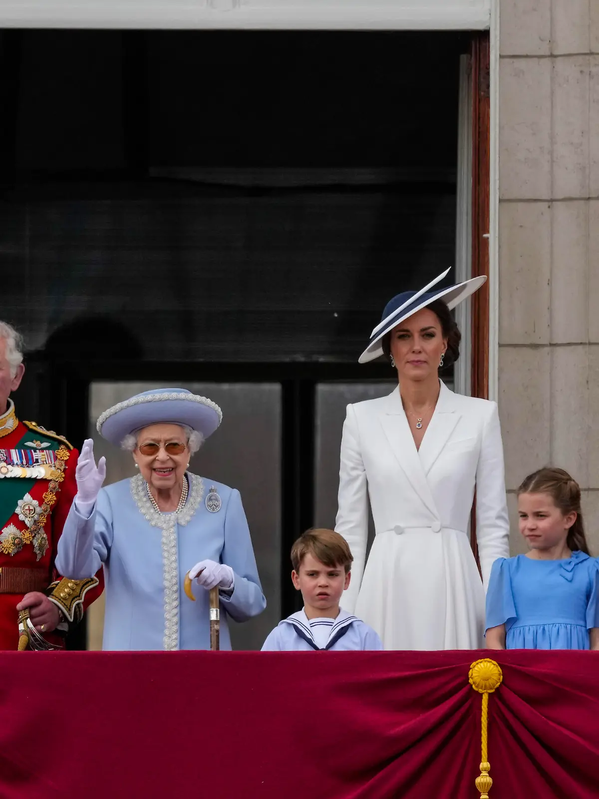 Camilla, Duchess of Cornwall, from left, Prince Charles, Queen Elizabeth II, Prince Louis, Kate, Duchess of Cambridge, Princess Charlotte, Prince George and Prince William on the balcony of Buckingham Palace, London, Thursday June 2, 2022, on the first of four days of celebrations to mark the Platinum Jubilee. The events over a long holiday weekend in the U.K. are meant to celebrate the monarch's 70 years of service. (Alastair Grant/Pool Photo via AP)