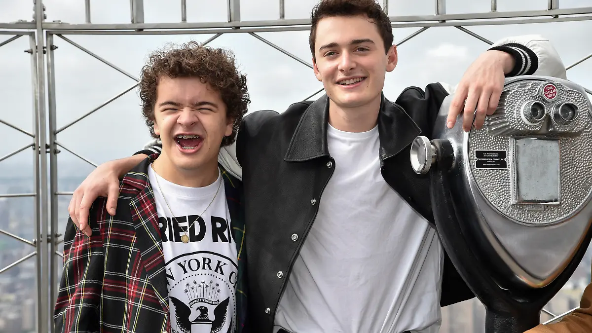 Actors Gaten Matarazzo, left, and Noah Schnapp pose on the 86th floor observatory at the Empire State Building in honor of the "Stranger Things" season four premiere and fan event on Thursday, May 26, 2022, in New York. (Photo by Evan Agostini/Invision/AP)