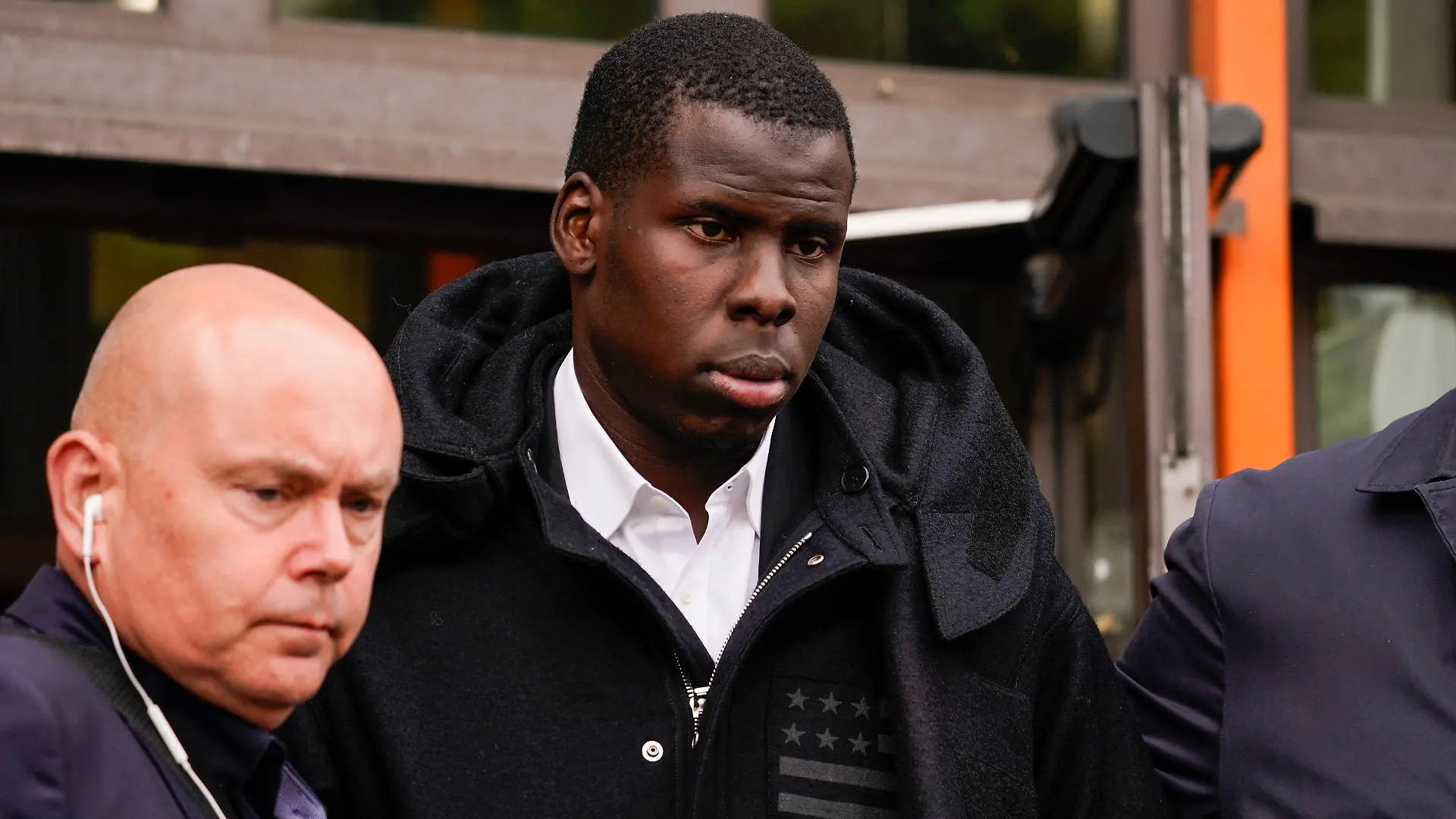 West Ham United player Kurt Zouma leaves Thames Magistrates Court after a hearing, in London, Tuesday, May 24, 2022. Zouma has pleaded guilty to kicking and slapping his pet cat in abuse caught on video. The 27-year-old France international appeared at the hearing accused of three offenses under the Animal Welfare Act in relation to footage of the abuse that surfaced on social media in February. Zouma pleaded guilty to two counts of causing unnecessary suffering to a protected animal. (AP Photo/Alberto Pezzali)