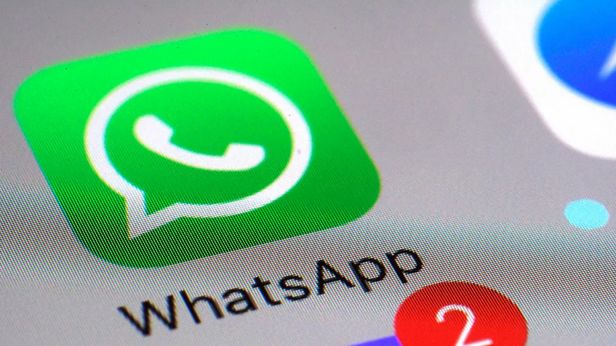 FILE - This March 10, 2017 file photo shows the WhatsApp communications app on a smartphone, in New York. The messaging app WhatsApp has sued the Indian government seeking to defend its users' privacy and stop new rules that would require it to make messages “traceable” to external parties. WhatsApp filed the lawsuit Wednesday, May 26, 2021 in the Delhi High Court, and is arguing that the government rules regarding the traceability of messages are unconstitutional and undermine the fundamental right to privacy. (AP Photo/Patrick Sison, File)