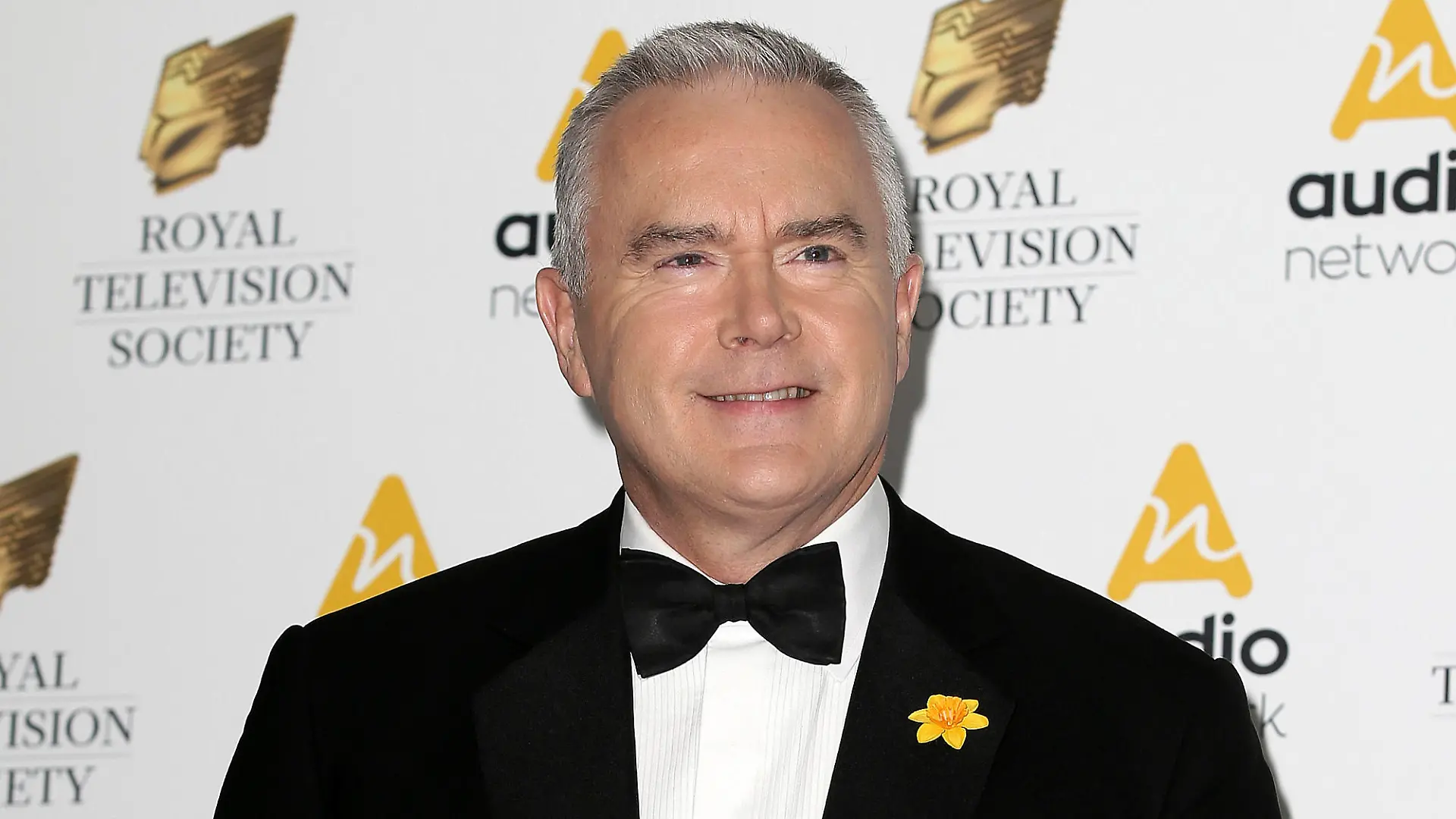 FILE - Journalist Huw Edwards poses for photographers upon arrival at the Royal Television Society Programme Awards at the Grosvenor Hotel in London, Tuesday, March 21, 2017. London police say there's no evidence that a BBC presenter who allegedly paid a teenager for sexually explicit photos committed a crime. The Metropolitan police issued the statement Wednesday, July 12, 2023 as the wife of Huw Edwards identified him as the presenter. (AP Photos/Tim Ireland, File)