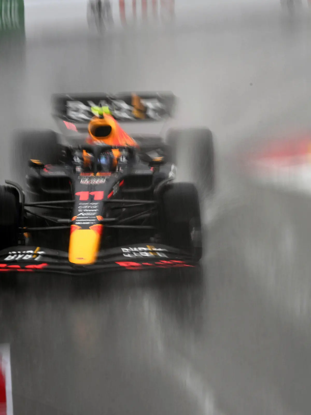 Red Bull driver Sergio Perez of Mexico warms up his car under heavy rain prior to the start of the Monaco Formula One Grand Prix, at the Monaco racetrack, in Monaco, Sunday, May 29, 2022. (Pool Photo/Christian Bruna/Via AP)