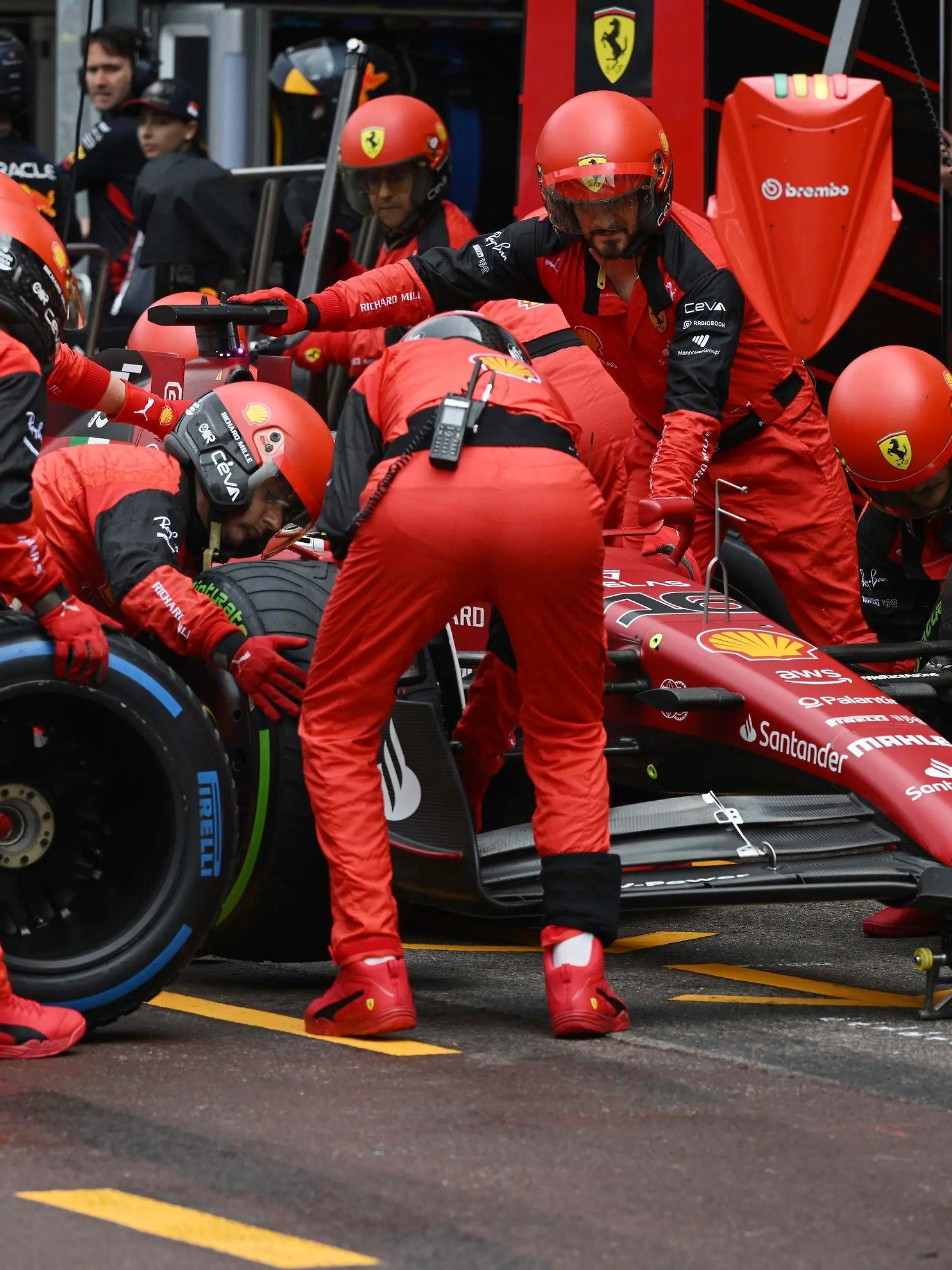 Ferrari driver Charles Leclerc of Monaco gets a pit service during the Monaco Formula One Grand Prix, at the Monaco racetrack, in Monaco, Sunday, May 29, 2022. (Pool Photo/Christian Bruna/Via AP)