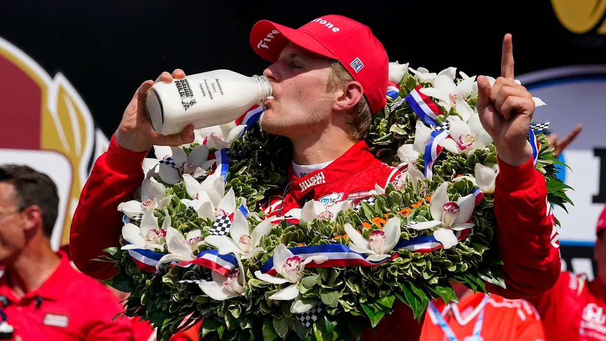 Marcus Ericsson, of Sweden, celebrates after winning the Indianapolis 500 auto race at Indianapolis Motor Speedway in Indianapolis, Sunday, May 29, 2022. (AP Photo/Michael Conroy)
