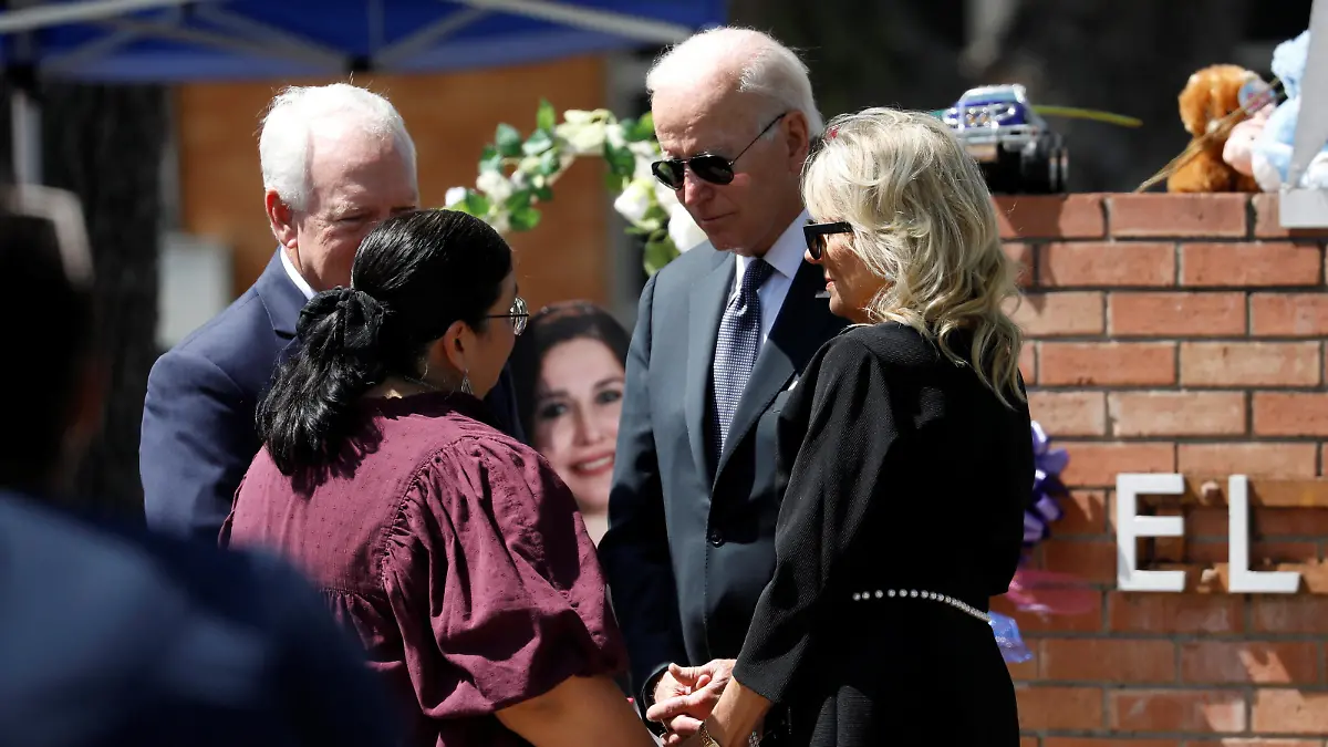 U.S. President Joe Biden and first lady Jill Bide speak with Uvalde Consolidated Independent School District (C.I.S.D.) Superintendent Hal Harrell and Mandy Gutierrez, Principal at Robb Elementary School, where a gunman killed 19 children and two teachers in the deadliest U.S. school shooting in nearly a decade, in Uvalde, Texas, U.S. May 29, 2022. REUTERS/Marco Bello