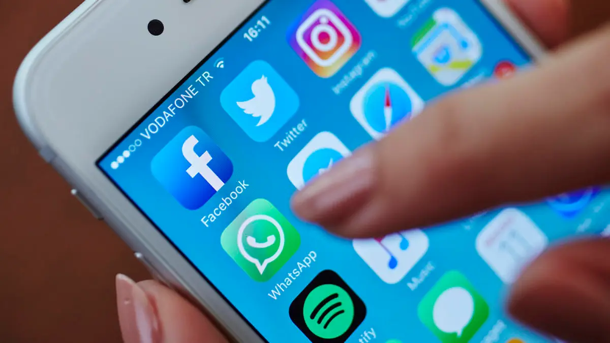 Istanbul, Turkey - July 11, 2016: Apple iPhone 6s screen with social media applications icons Facebook, Instagram, Twitter, Spotify, Youtube, Messenger, Apple Music, Safari, Maps, Whatsapp etc.