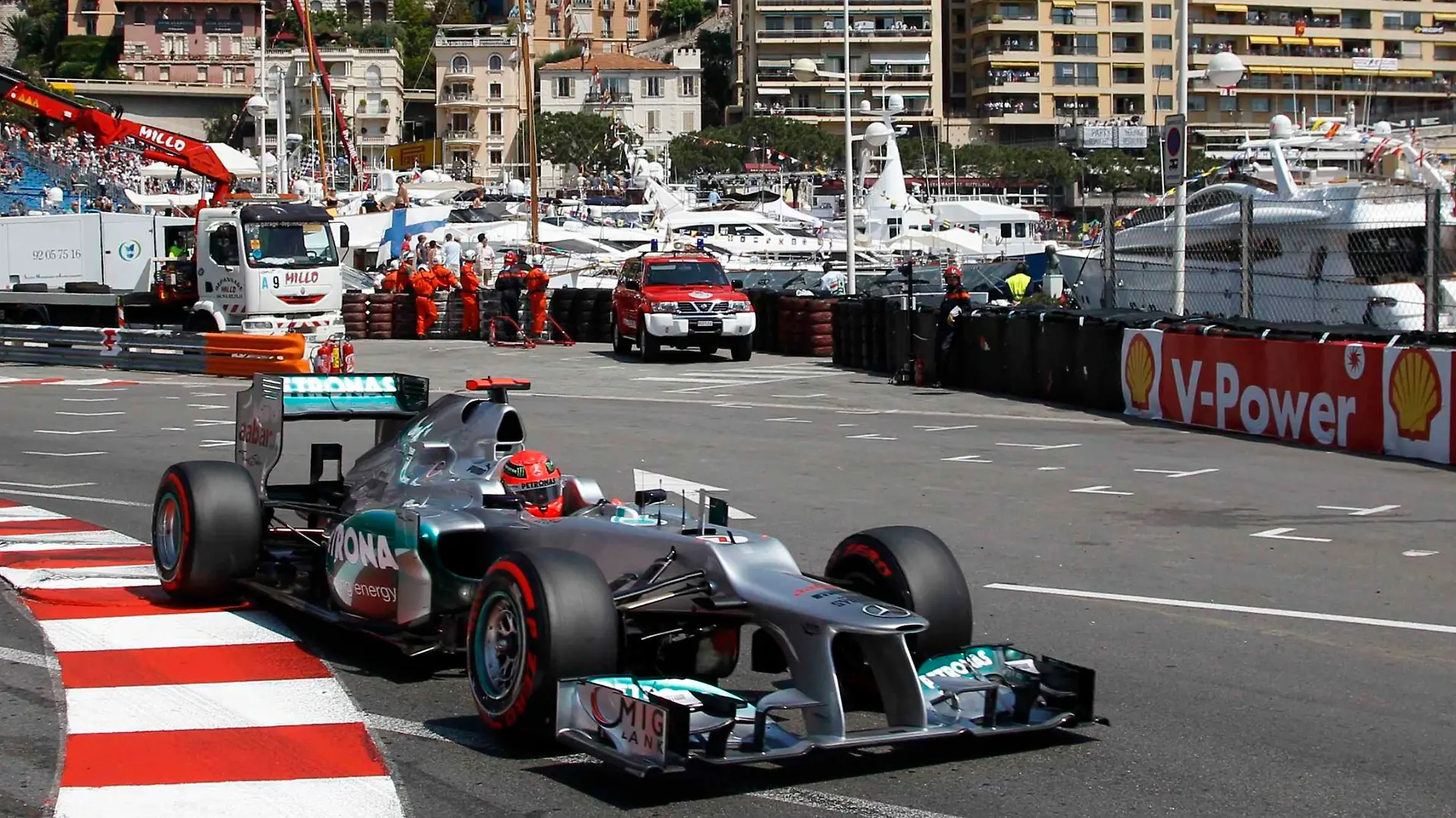 Mercedes Formula One driver Michael Schumacher of Germany takes a curve during the third practice session of the Monaco F1 Grand Prix May 26, 2012. REUTERS/Max Rossi (MONACO - Tags: SPORT MOTORSPORT)