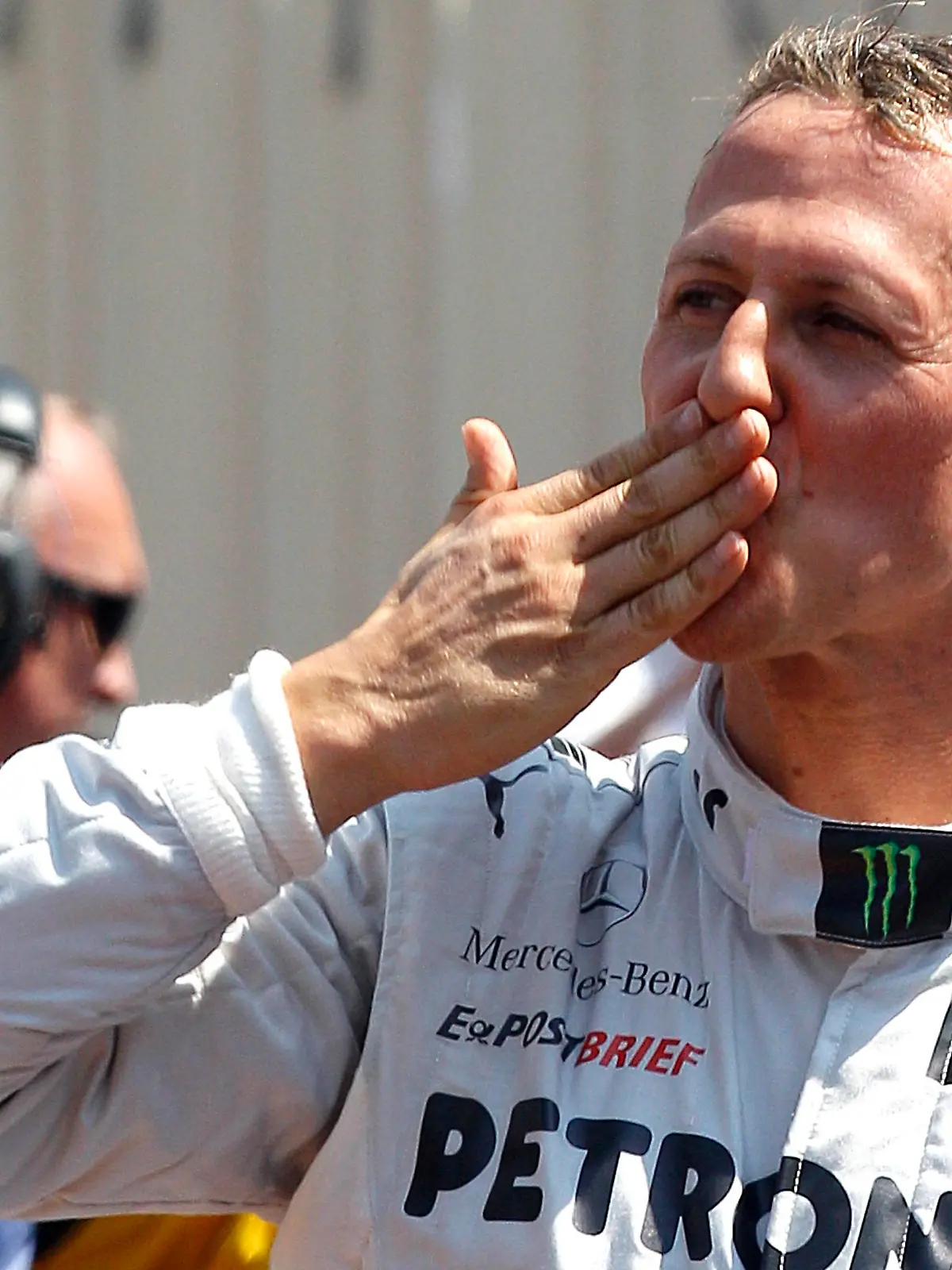 Mercedes Formula One driver Michael Schumacher of Germany celebrates being the fastest in qualifying at the Monaco F1 Grand Prix May 26, 2012. Schumacher's departure from the Mercedes Formula One team was sealed on September 28, 2012 after the seven-times world champion recorded only one podium finish since his comeback in 2010. Schumacher, 43, the sport's most successful driver with a record 91 Grand Prix victories, will be replaced in 2013 by Lewis Hamilton, who has signed a three-year deal with the British-based team. Picture taken May 26, 2012. REUTERS/Max Rossi/Files  (MONACO - Tags: SPORT MOTORSPORT F1)