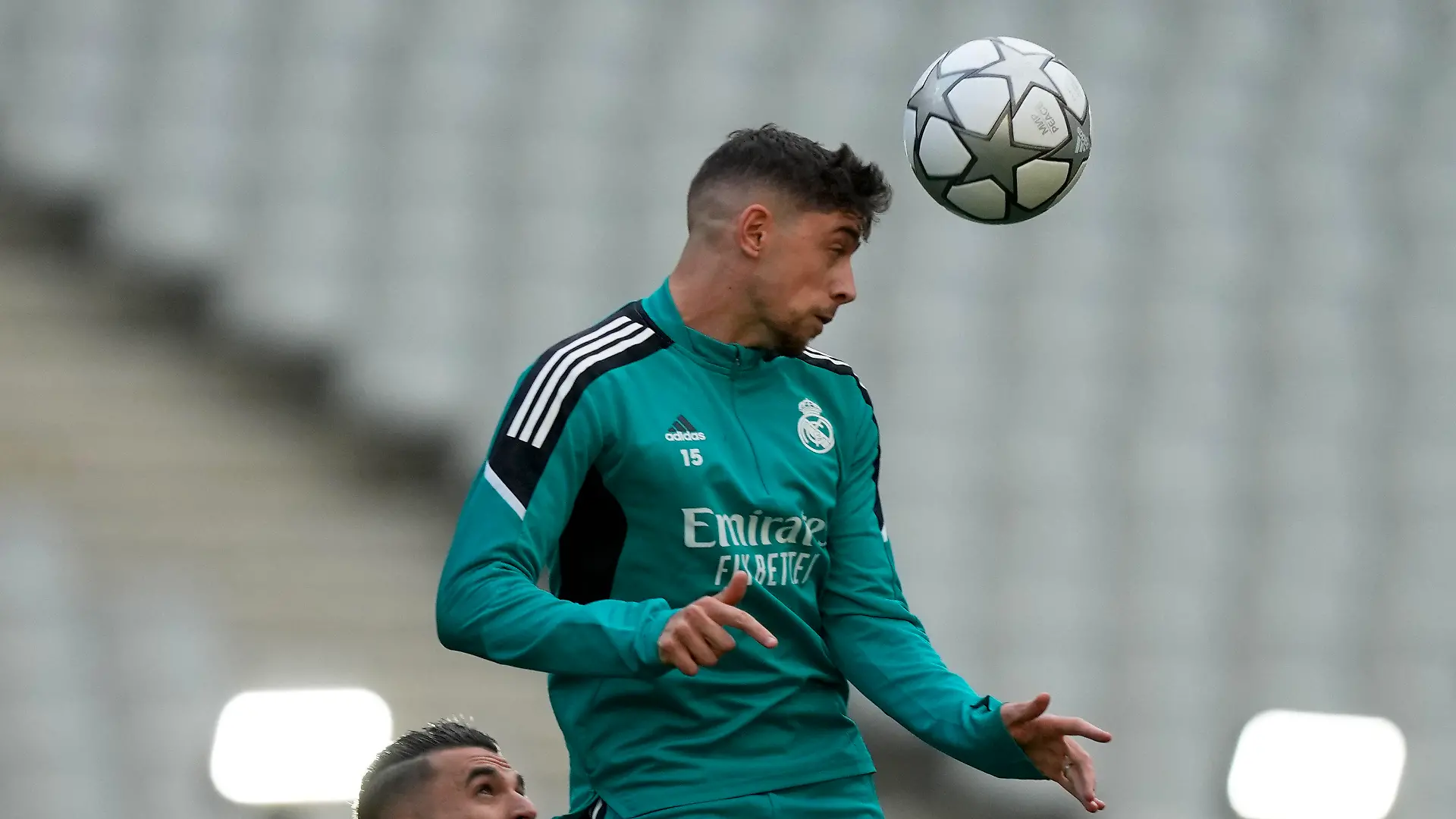 Real Madrid's Federico Valverde heads a ball during a training session at the Stade de France in Saint Denis near Paris, Friday, May 27, 2022. Liverpool and Real Madrid are making their final preparations before facing each other in the Champions League final soccer match on Saturday. (AP Photo/Frank Augstein)