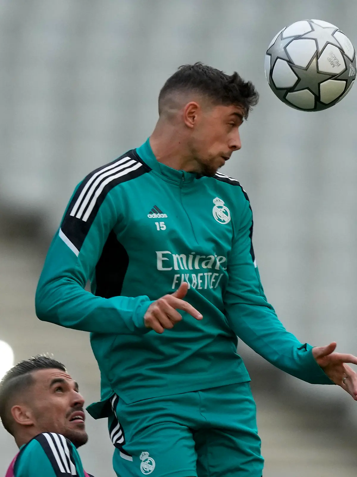Real Madrid's Federico Valverde heads a ball during a training session at the Stade de France in Saint Denis near Paris, Friday, May 27, 2022. Liverpool and Real Madrid are making their final preparations before facing each other in the Champions League final soccer match on Saturday. (AP Photo/Frank Augstein)