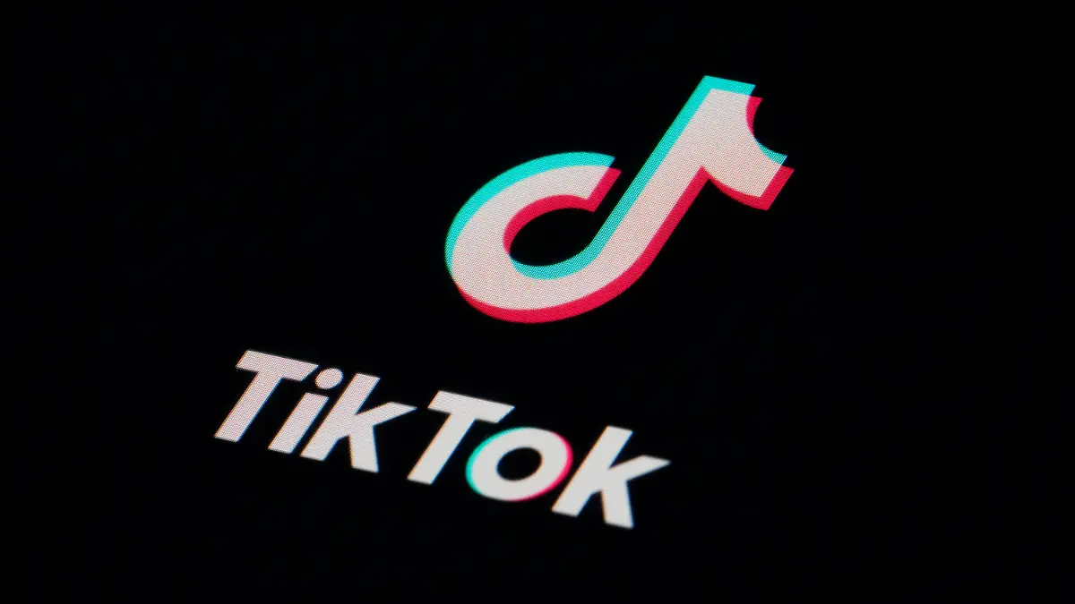 FILE - The icon for the video sharing TikTok app is seen on a smartphone, Feb. 28, 2023, in Marple Township, Pa. The state of Montana is asking a federal judge to allow its ban on downloading TikTok to take effect in January, even though the company argues it violates free speech rights. The state argues there are other apps that people can use to communicate with each other that don't include the risk of sharing data with the Chinese government. The company and content creators had asked the judge to temporarily block the law from taking effect while their legal challenge plays out. (AP Photo/Matt Slocum, File)