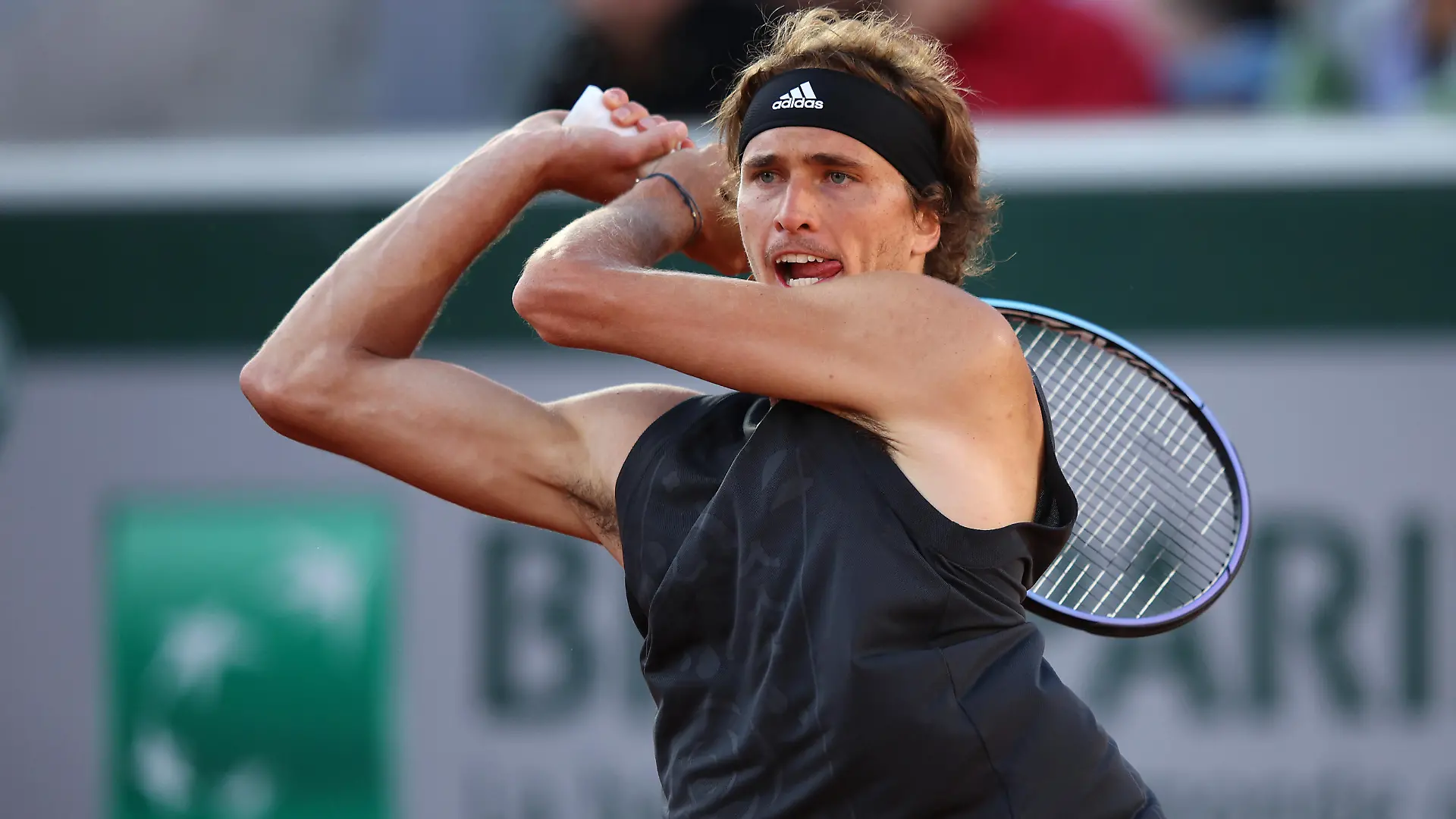 PARIS, FRANCE - MAY 27: Alexander Zverev of Germany plays a backhand against Brandon Nakashima of The United States during the Men's Singles Third Round match on Day 6 of The 2022 French Open at Roland Garros on May 27, 2022 in Paris, France. (Photo by Adam Pretty/Getty Images)