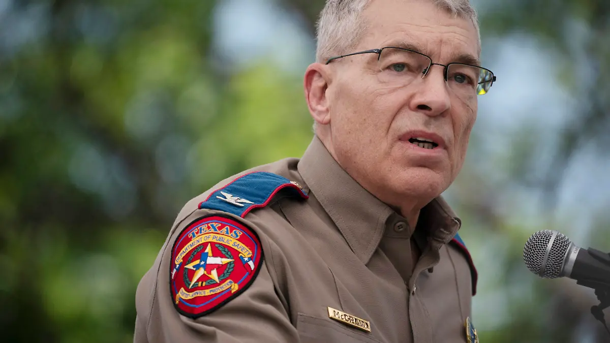 Texas Department of Public Safety Director Steven McCraw speaks during a press conference held outside Robb Elementary School on Friday, May 27, 2022, in Uvalde, Texas. Nearly 20 officers stood in a hallway outside of the classrooms during this week's attack on a Texas elementary school for more than 45 minutes before agents used a master key to open a door and confront a gunman, authorities said Friday. (AP Photo/Wong Maye-E)