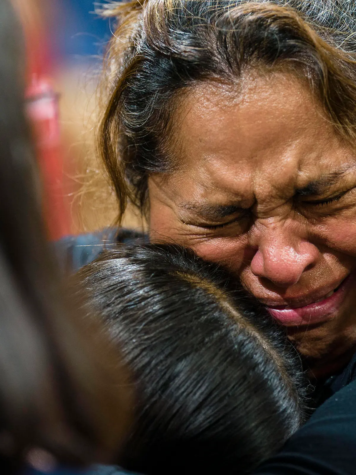  May 25, 2022, Uvalde, Texas: A fourth-grade teacher at Robb Elementary School in Uvalde, Texas hugs her student at the vigil for the victims of the mass shooting at their school which left 19 students, 2 adults and the gunman dead. The teacher said her classroom was right next to where the gunman barricaded himself and she told her students to pray after taking shelter. Uvalde Texas - ZUMAh163 20220525_znp_h163_042 Copyright: xJintakxHanx