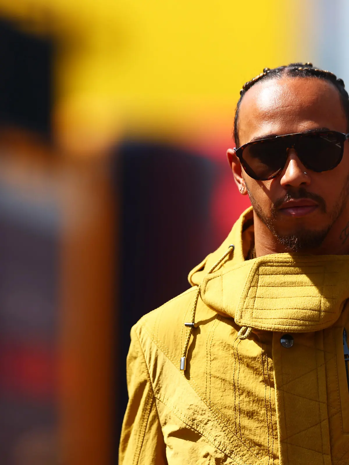 BARCELONA, SPAIN - MAY 20: Lewis Hamilton of Great Britain and Mercedes walks in the Paddock prior to practice ahead of the F1 Grand Prix of Spain at Circuit de Barcelona-Catalunya on May 20, 2022 in Barcelona, Spain. (Photo by Mark Thompson/Getty Images)