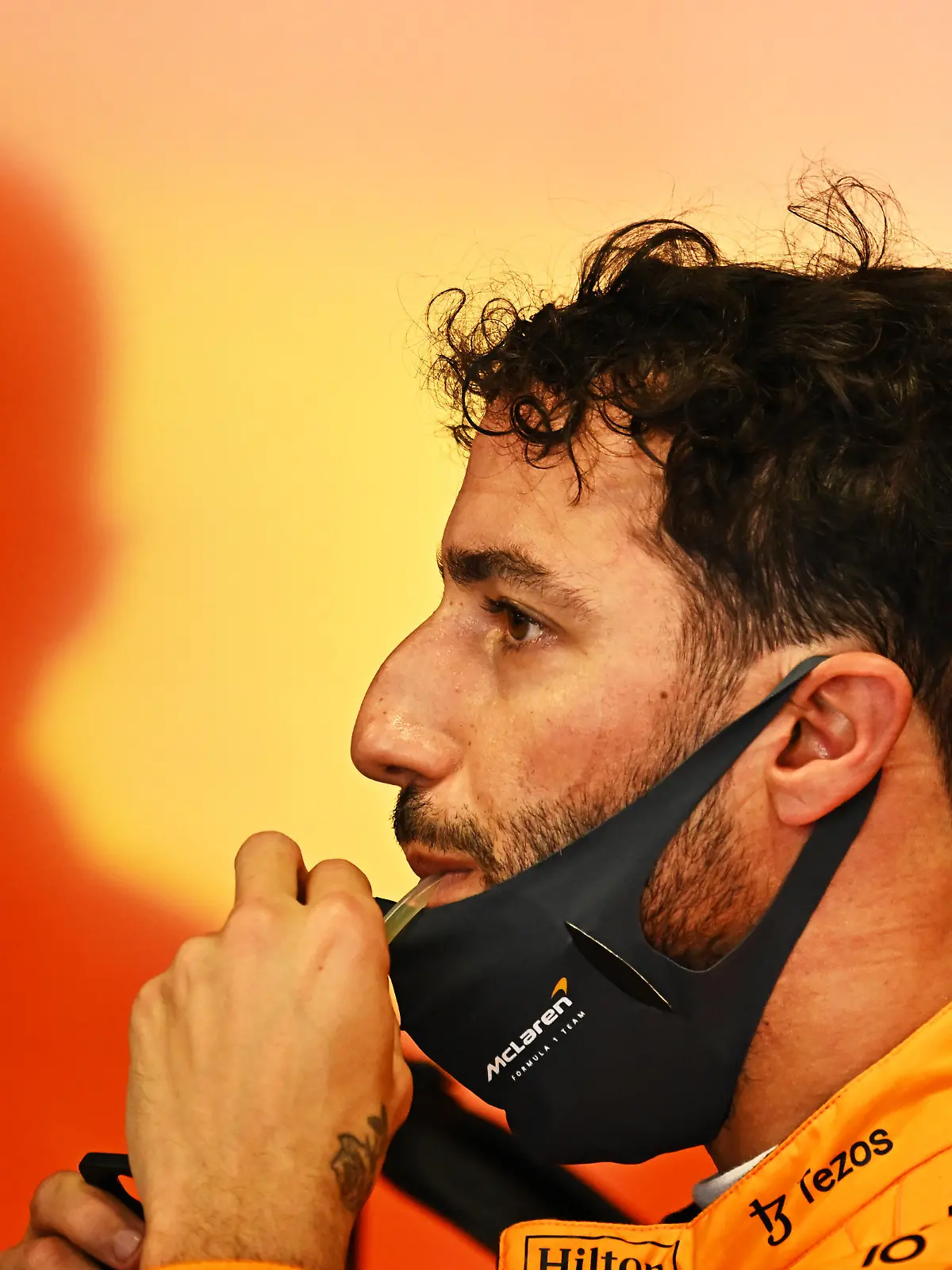 BARCELONA, SPAIN - MAY 21: Daniel Ricciardo of Australia and McLaren looks on in the garage during practice ahead of the F1 Grand Prix of Spain at Circuit de Barcelona-Catalunya on May 21, 2022 in Barcelona, Spain. (Photo by Clive Mason/Getty Images)