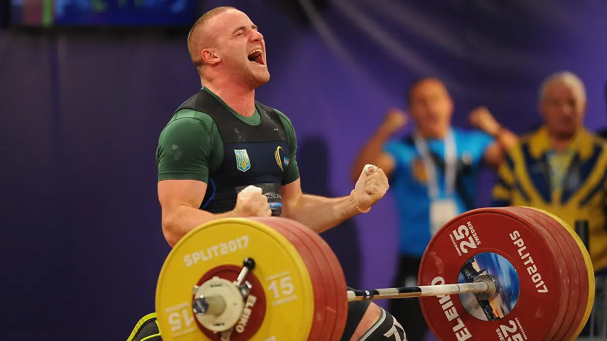 SPLIT, CROATIA - APRIL 06 : Oleksandr Pielieshenko of Ukraine gestures after he made a succesful attempt during the Men's Final 85 kg competition of the Weightlifting European Championships 2017 in Split, Croatia on April 06, 2017. Stringer / Anadolu Agency